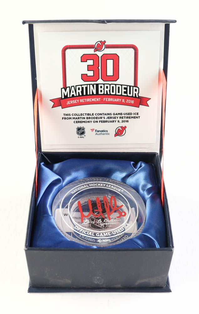 Martin Brodeur Signed 2016 Jersey Retirement Commemorative Crystal Hockey Puck with Game-Used Ice (Fanatics) at PristineAuction.com Martin Brodeur Signed 2016 Jersey Retirement Commemorative Crystal Hockey Puck with Game-Used Ice (Fanatics) at PristineAuction.com