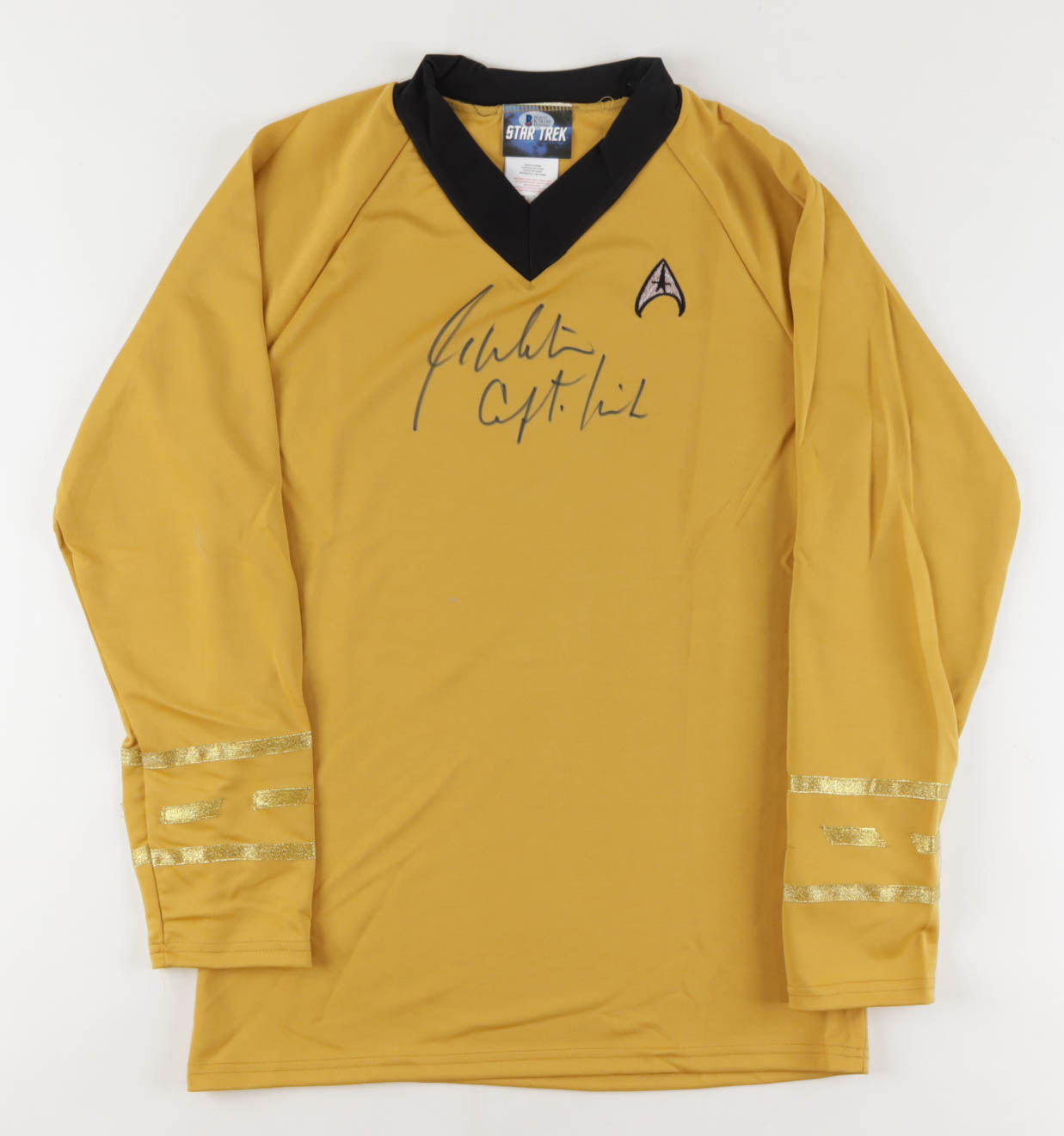 William Shatner Signed Prop Replica Uniform Shirt Inscribed "Capt. Kirk" (Beckett) at PristineAuction.com William Shatner Signed Prop Replica Uniform Shirt Inscribed "Capt. Kirk" (Beckett) at PristineAuction.com