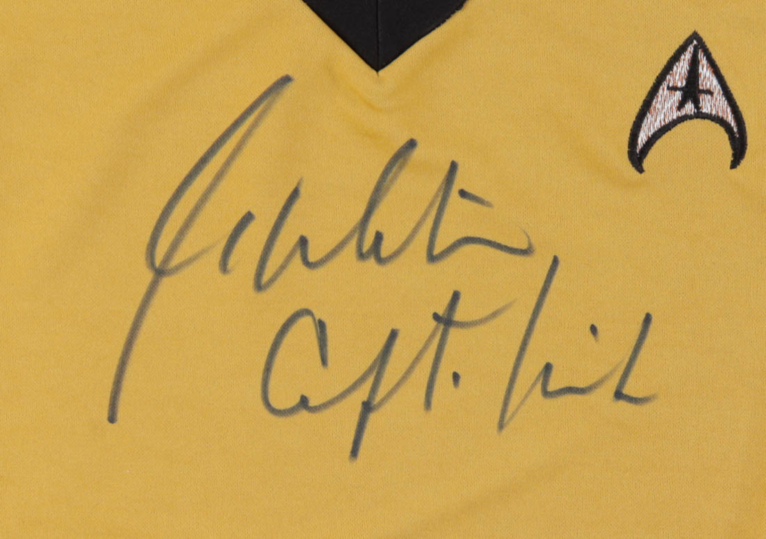 William Shatner Signed Prop Replica Uniform Shirt Inscribed "Capt. Kirk" (Beckett) at PristineAuction.com William Shatner Signed Prop Replica Uniform Shirt Inscribed "Capt. Kirk" (Beckett) at PristineAuction.com
