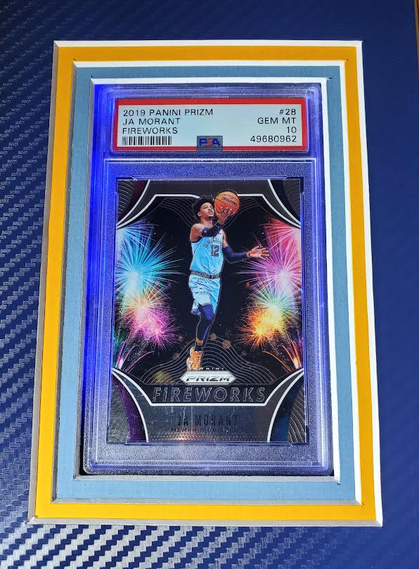 Ja Morant Signed Grizzlies 33x42 Custom Framed Jersey Display with LED Backlit Display with 2019 Panini Prizm Fireworks #28 & 2019 Panini Mosaic #274 (Panini) at PristineAuction.com Ja Morant Signed Grizzlies 33x42 Custom Framed Jersey Display with LED Backlit Display with 2019 Panini Prizm Fireworks #28 & 2019 Panini Mosaic #274 (Panini) at PristineAuction.com