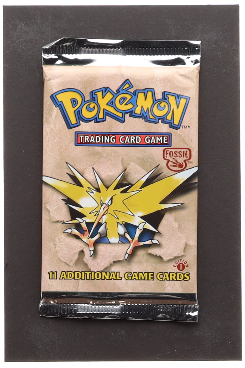 1999 Pokemon TCG Fossil First Edition Booster Pack with (11) Cards at PristineAuction.com 1999 Pokemon TCG Fossil First Edition Booster Pack with (11) Cards at PristineAuction.com