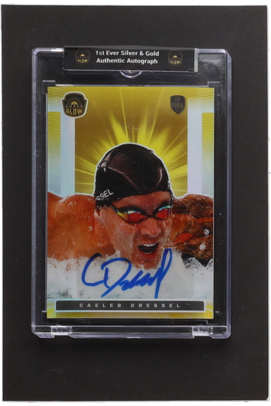 Caeleb Dressel 2021 Super Glow Holiday Silver and Gold Glow Autograph #7 at PristineAuction.com Caeleb Dressel 2021 Super Glow Holiday Silver and Gold Glow Autograph #7 at PristineAuction.com