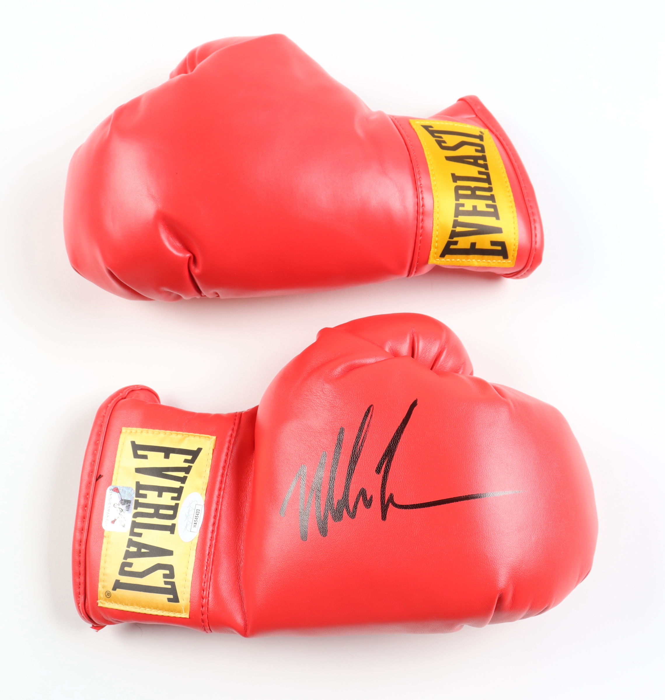 Mike Tyson Signed Pair of Everlast Boxing Gloves (JSA & Tyson) at PristineAuction.com Mike Tyson Signed Pair of Everlast Boxing Gloves (JSA & Tyson) at PristineAuction.com