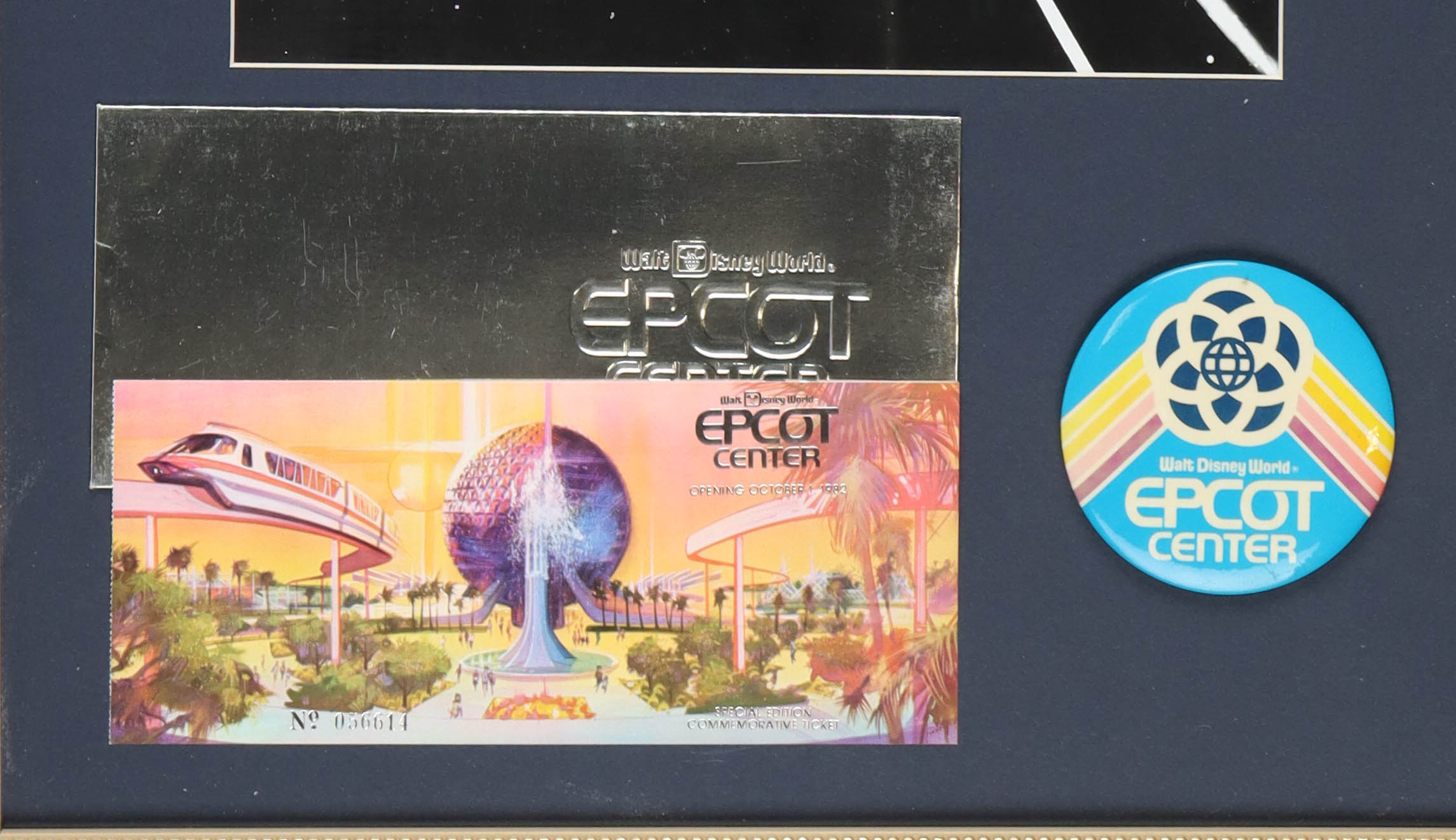 Walt Disney's "Epcot Center" Custom Framed Print Display with Epcot Lapel Pin & Opening Day Commemorative Ticket Envelope at PristineAuction.com Walt Disney's "Epcot Center" Custom Framed Print Display with Epcot Lapel Pin & Opening Day Commemorative Ticket Envelope at PristineAuction.com