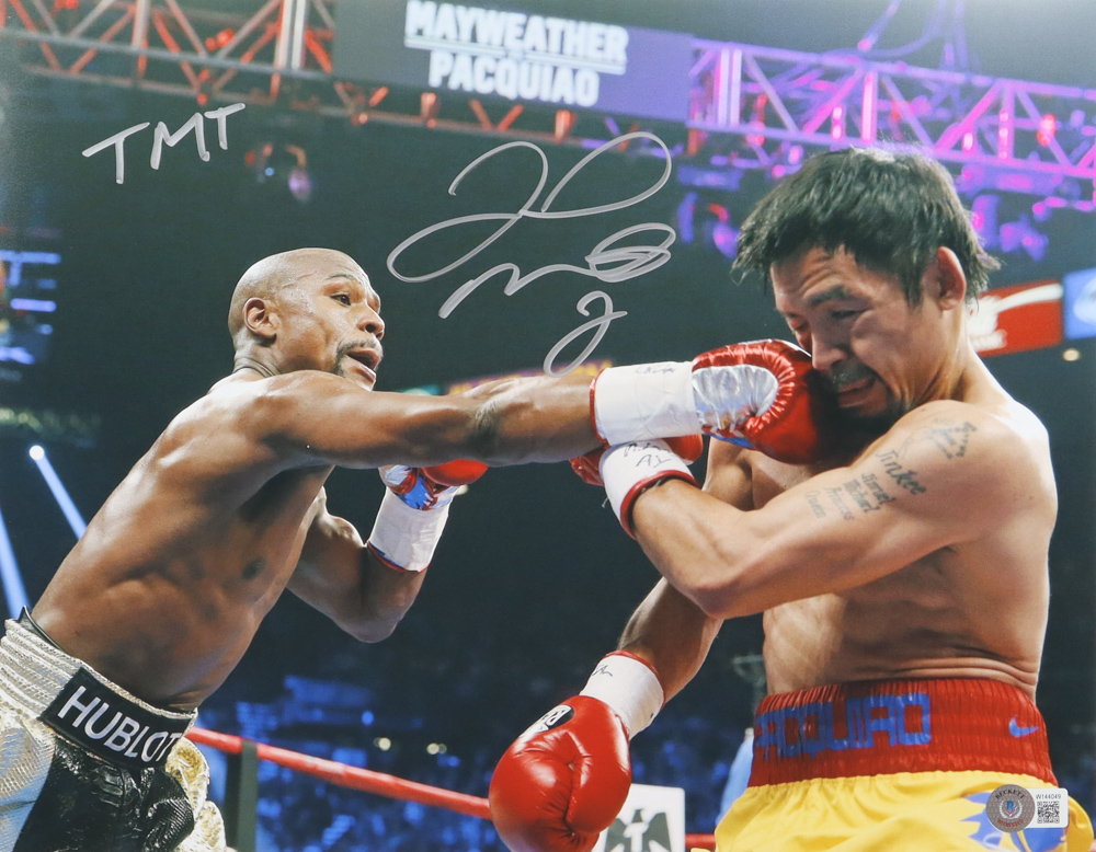 Floyd Mayweather Jr. Signed 11x14 Photo vs. Manny Pacquiao Inscribed "TMT" (Beckett) at PristineAuction.com Floyd Mayweather Jr. Signed 11x14 Photo vs. Manny Pacquiao Inscribed "TMT" (Beckett) at PristineAuction.com