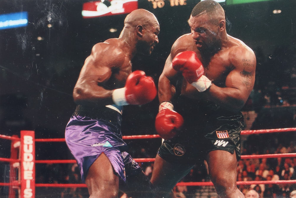 Mike Tyson Signed Ringside Boxing Glove with Wrist Wraps & Photo Display Case (JSA & Tyson) at PristineAuction.com Mike Tyson Signed Ringside Boxing Glove with Wrist Wraps & Photo Display Case (JSA & Tyson) at PristineAuction.com