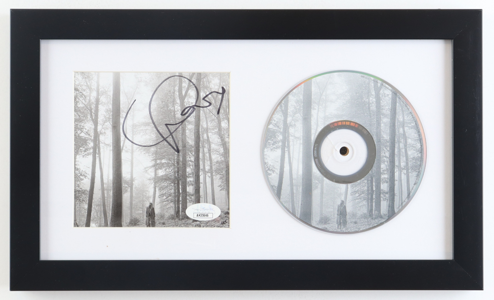 Taylor Swift Signed Custom Framed "Folklore" CD Booklet Display (JSA) at PristineAuction.com Taylor Swift Signed Custom Framed "Folklore" CD Booklet Display (JSA) at PristineAuction.com