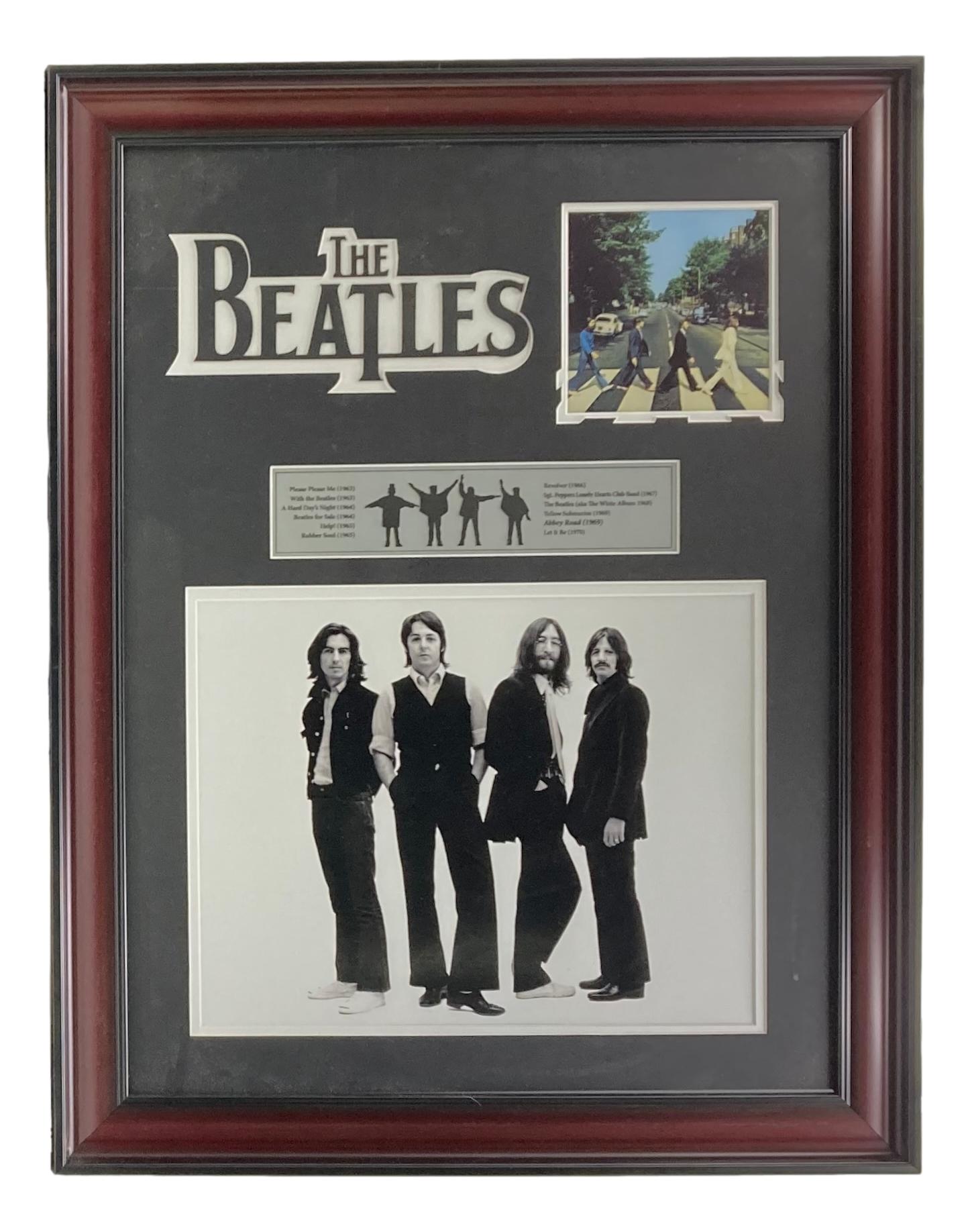 The Beatles Custom Framed Photo Display at PristineAuction.com The Beatles Custom Framed Photo Display at PristineAuction.com