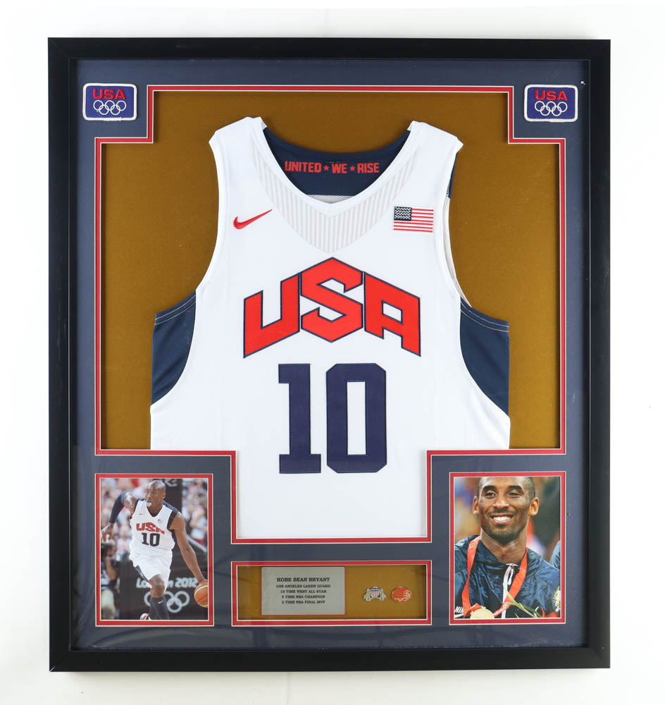 Kobe Bryant Custom Framed Team USA Jersey Display with (2) Olympic Basketball Pins at PristineAuction.com Kobe Bryant Custom Framed Team USA Jersey Display with (2) Olympic Basketball Pins at PristineAuction.com