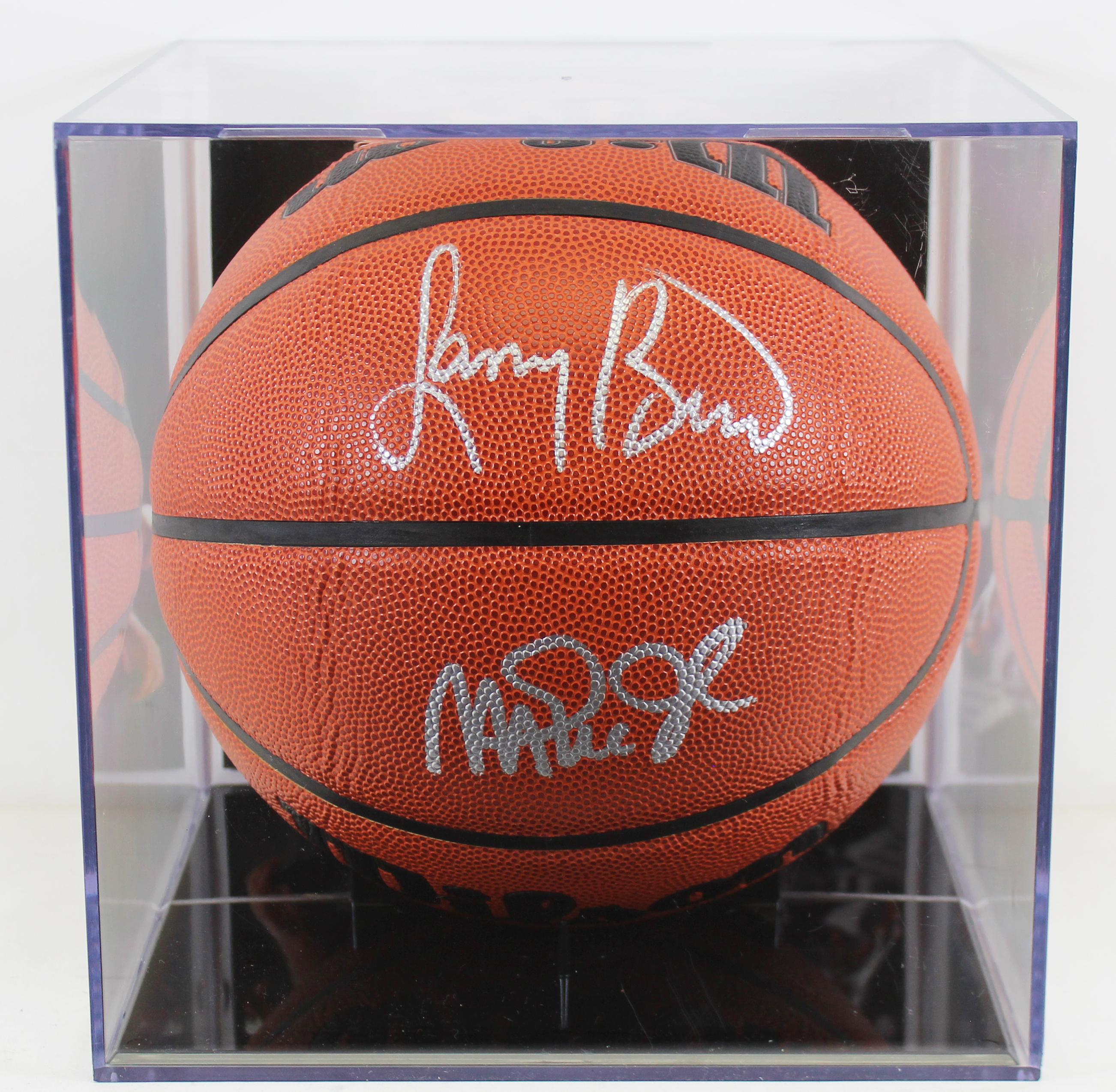 Magic Johnson & Larry Bird Signed Basketball with Display Case (Beckett) at PristineAuction.com Magic Johnson & Larry Bird Signed Basketball with Display Case (Beckett) at PristineAuction.com