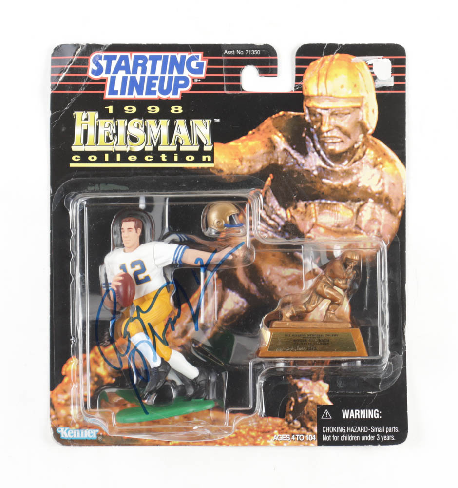Roger Staubach Signed Starting 1998 Heisman Collection Figure with Trading Card (PSA) at PristineAuction.com Roger Staubach Signed Starting 1998 Heisman Collection Figure with Trading Card (PSA) at PristineAuction.com