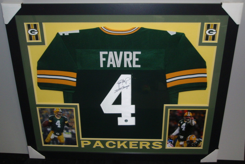 Brett Favre Signed Packers 35x43 Custom Framed Jersey Inscribed "SB XXXI Champs!" (Favre COA) at PristineAuction.com Brett Favre Signed Packers 35x43 Custom Framed Jersey Inscribed "SB XXXI Champs!" (Favre COA) at PristineAuction.com