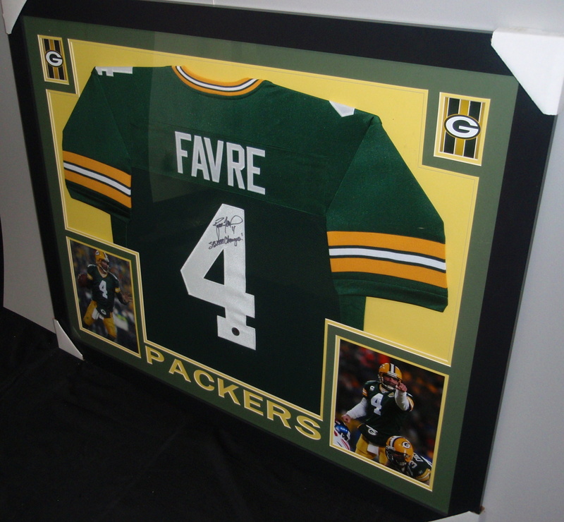 Brett Favre Signed Packers 35x43 Custom Framed Jersey Inscribed "SB XXXI Champs!" (Favre COA) at PristineAuction.com Brett Favre Signed Packers 35x43 Custom Framed Jersey Inscribed "SB XXXI Champs!" (Favre COA) at PristineAuction.com