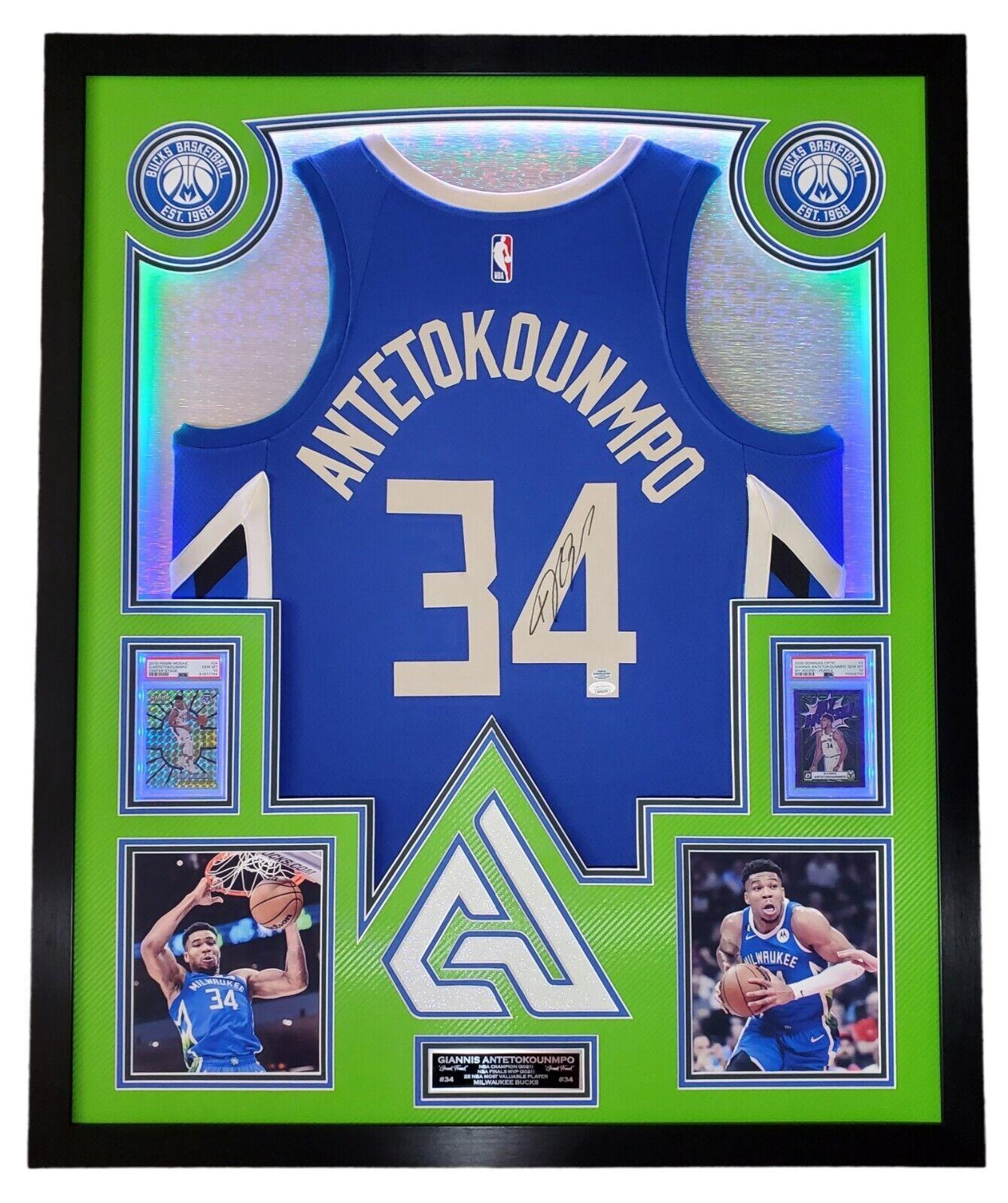 Giannis Antetokounmpo Signed 42x33 Custom Framed "The City" Jersey LED Backlit Display (JSA & Antetokounmpo) at PristineAuction.com Giannis Antetokounmpo Signed 42x33 Custom Framed "The City" Jersey LED Backlit Display (JSA & Antetokounmpo) at PristineAuction.com