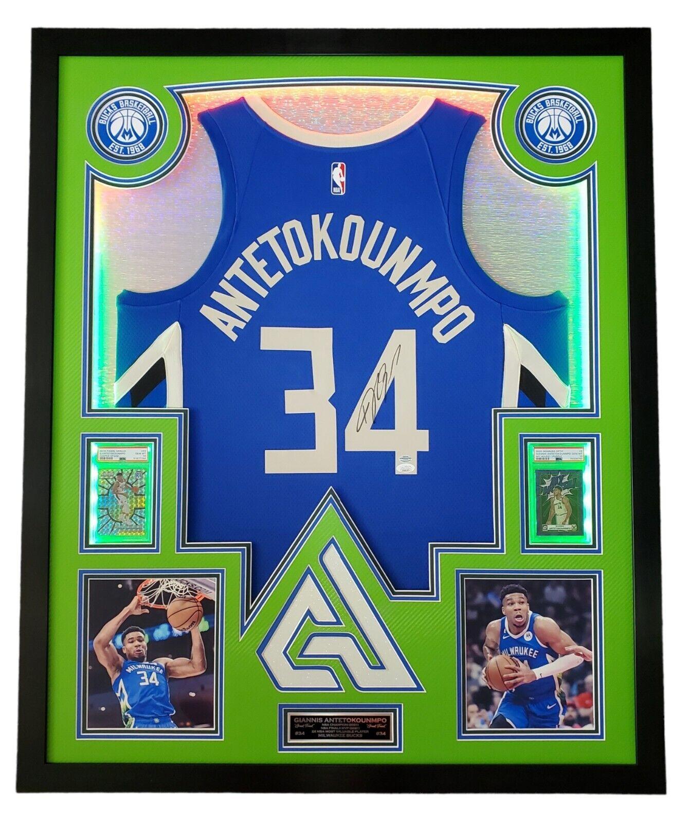 Giannis Antetokounmpo Signed 42x33 Custom Framed "The City" Jersey LED Backlit Display (JSA & Antetokounmpo) at PristineAuction.com Giannis Antetokounmpo Signed 42x33 Custom Framed "The City" Jersey LED Backlit Display (JSA & Antetokounmpo) at PristineAuction.com