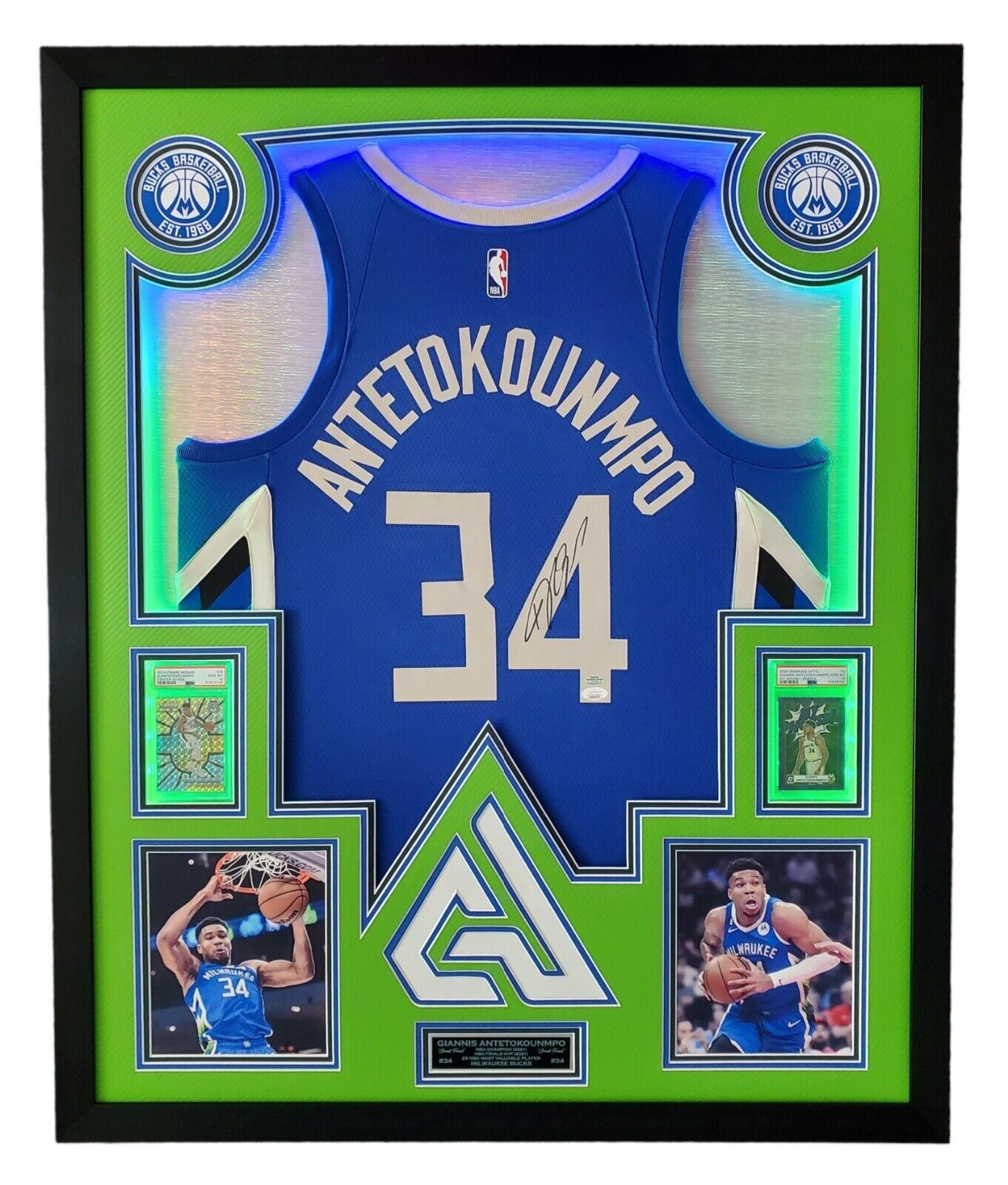 Giannis Antetokounmpo Signed 42x33 Custom Framed "The City" Jersey LED Backlit Display (JSA & Antetokounmpo) at PristineAuction.com Giannis Antetokounmpo Signed 42x33 Custom Framed "The City" Jersey LED Backlit Display (JSA & Antetokounmpo) at PristineAuction.com