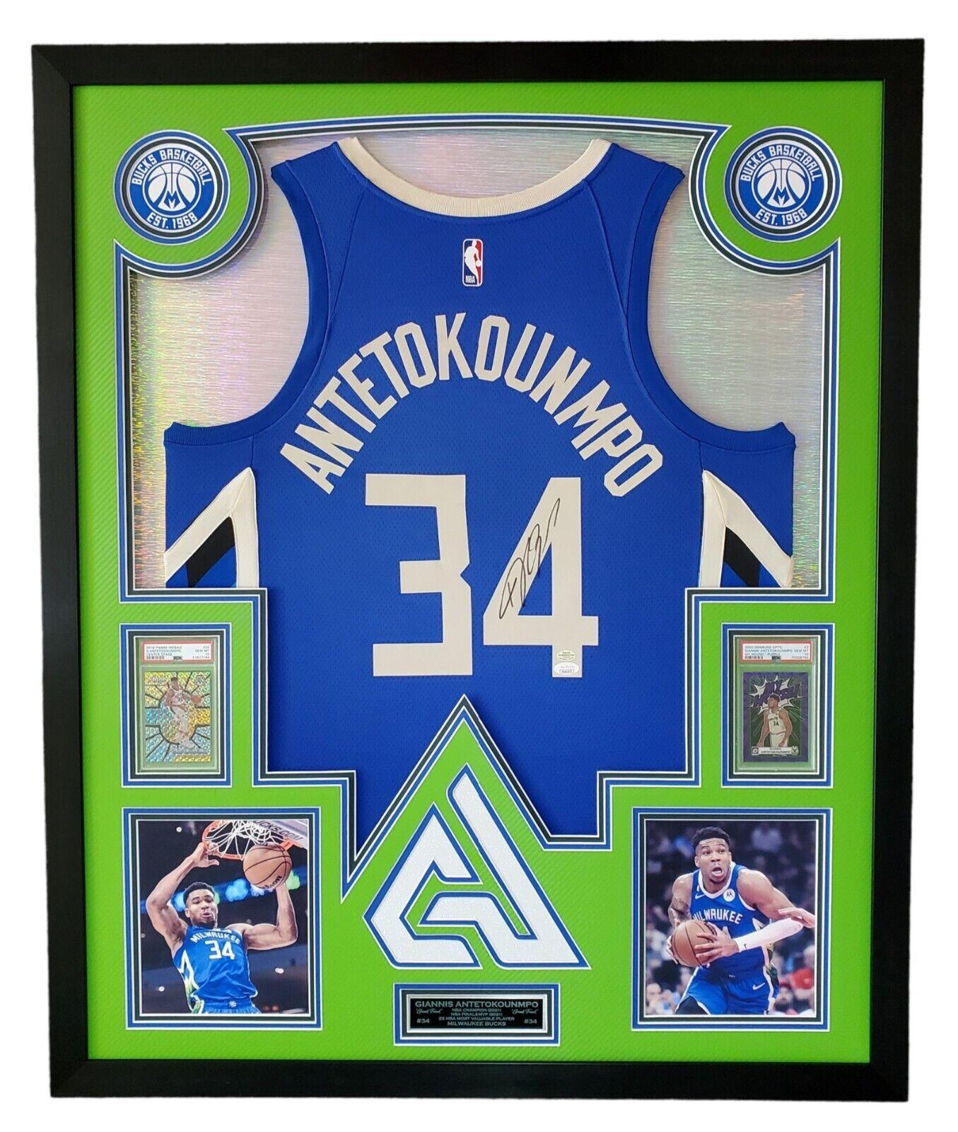 Giannis Antetokounmpo Signed 42x33 Custom Framed "The City" Jersey LED Backlit Display (JSA & Antetokounmpo) at PristineAuction.com Giannis Antetokounmpo Signed 42x33 Custom Framed "The City" Jersey LED Backlit Display (JSA & Antetokounmpo) at PristineAuction.com