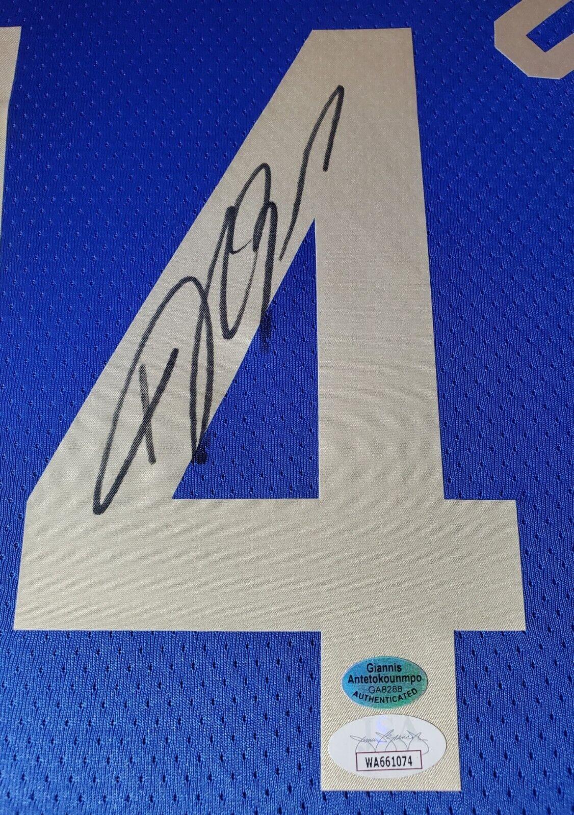 Giannis Antetokounmpo Signed 42x33 Custom Framed "The City" Jersey LED Backlit Display (JSA & Antetokounmpo) at PristineAuction.com Giannis Antetokounmpo Signed 42x33 Custom Framed "The City" Jersey LED Backlit Display (JSA & Antetokounmpo) at PristineAuction.com