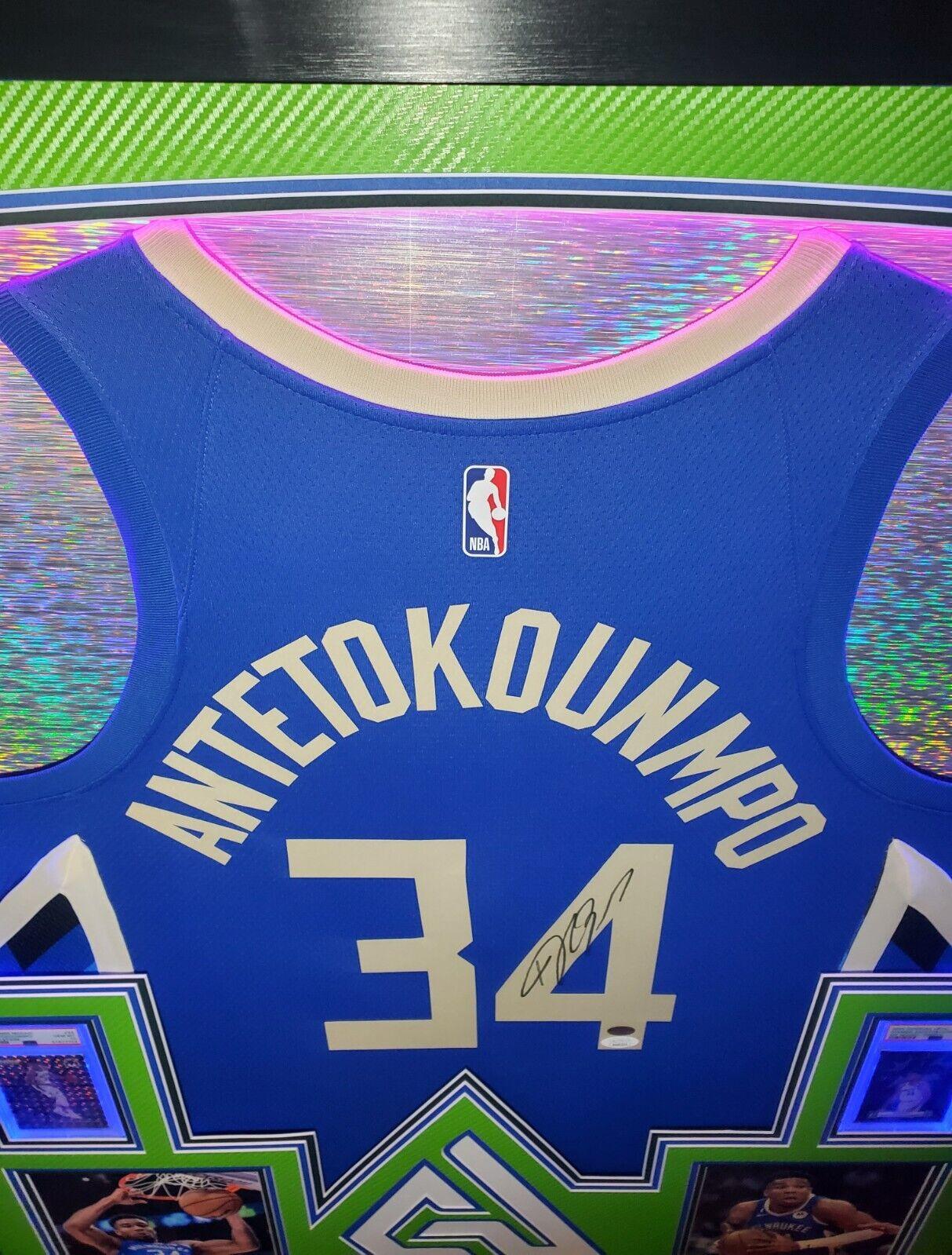 Giannis Antetokounmpo Signed 42x33 Custom Framed "The City" Jersey LED Backlit Display (JSA & Antetokounmpo) at PristineAuction.com Giannis Antetokounmpo Signed 42x33 Custom Framed "The City" Jersey LED Backlit Display (JSA & Antetokounmpo) at PristineAuction.com