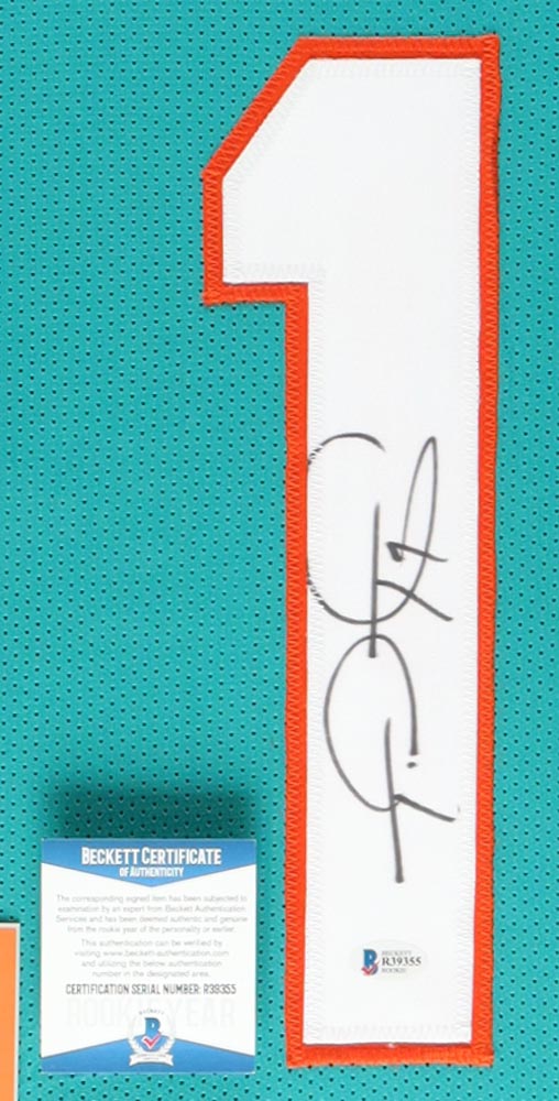 Tua Tagovailoa Signed Custom Framed Jersey Display (Beckett) at PristineAuction.com Tua Tagovailoa Signed Custom Framed Jersey Display (Beckett) at PristineAuction.com