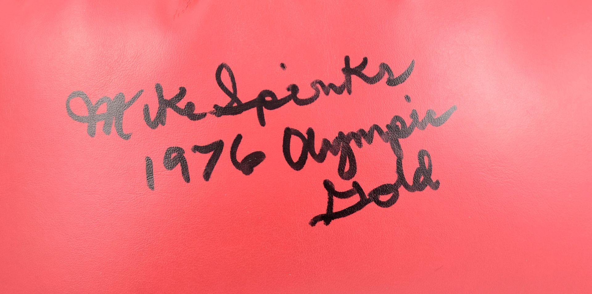 Michael Spinks Signed Everlast Boxing Glove Inscribed "1976 Olympic Gold" (Beckett) at PristineAuction.com Michael Spinks Signed Everlast Boxing Glove Inscribed "1976 Olympic Gold" (Beckett) at PristineAuction.com