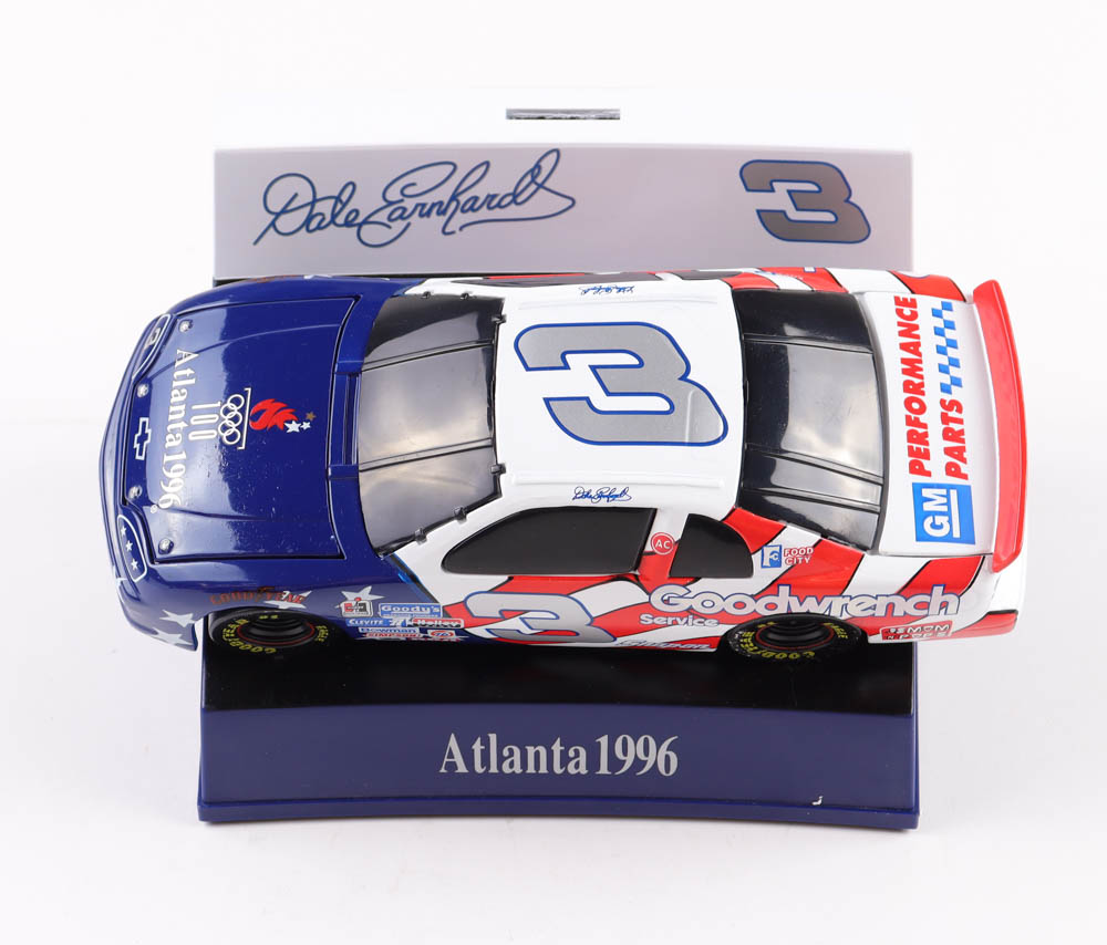 Dale Earnhardt LE #3 100th Olympics Atlanta 1996 Monte Carlo 1:24 Scale Die-Cast Car with Grandstand at PristineAuction.com Dale Earnhardt LE #3 100th Olympics Atlanta 1996 Monte Carlo 1:24 Scale Die-Cast Car with Grandstand at PristineAuction.com