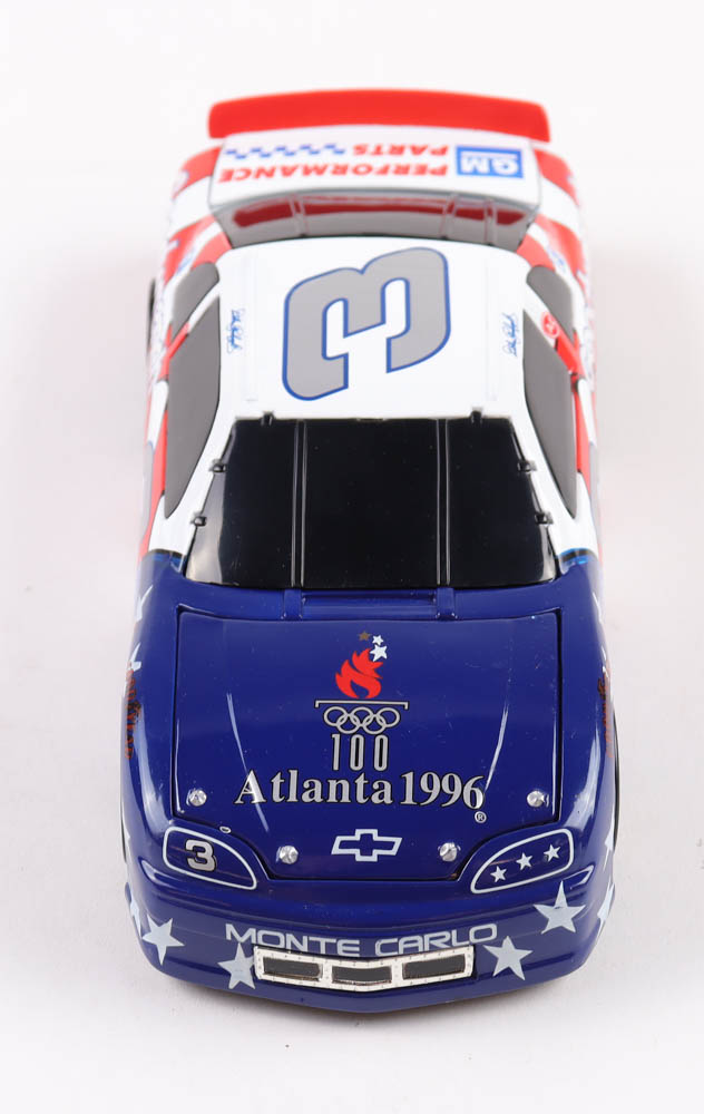 Dale Earnhardt LE #3 100th Olympics Atlanta 1996 Monte Carlo 1:24 Scale Die-Cast Car with Grandstand at PristineAuction.com Dale Earnhardt LE #3 100th Olympics Atlanta 1996 Monte Carlo 1:24 Scale Die-Cast Car with Grandstand at PristineAuction.com