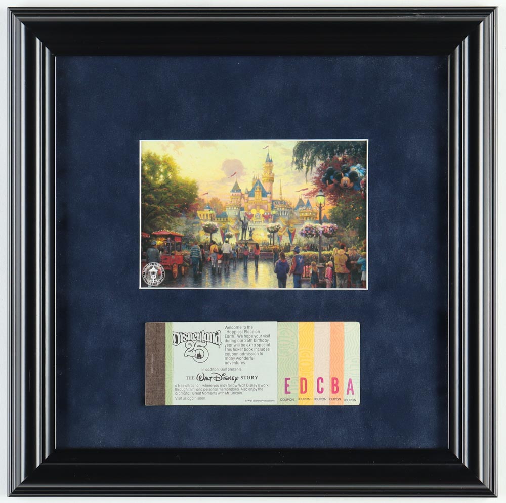 Thomas Kinkade Disneyland Custom Framed Art Print Display With Vintage Ticket Book at PristineAuction.com Thomas Kinkade Disneyland Custom Framed Art Print Display With Vintage Ticket Book at PristineAuction.com