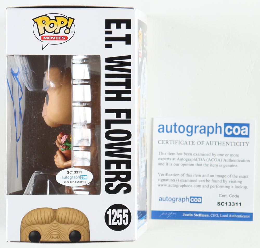 Steven Spielberg Signed "E.T. The Extra-Terrestrial" #1255 E.T. With Flowers Funko Pop! Vinyl Figure Inscribed "ET" (AutographCOA) at PristineAuction.com Steven Spielberg Signed "E.T. The Extra-Terrestrial" #1255 E.T. With Flowers Funko Pop! Vinyl Figure Inscribed "ET" (AutographCOA) at PristineAuction.com