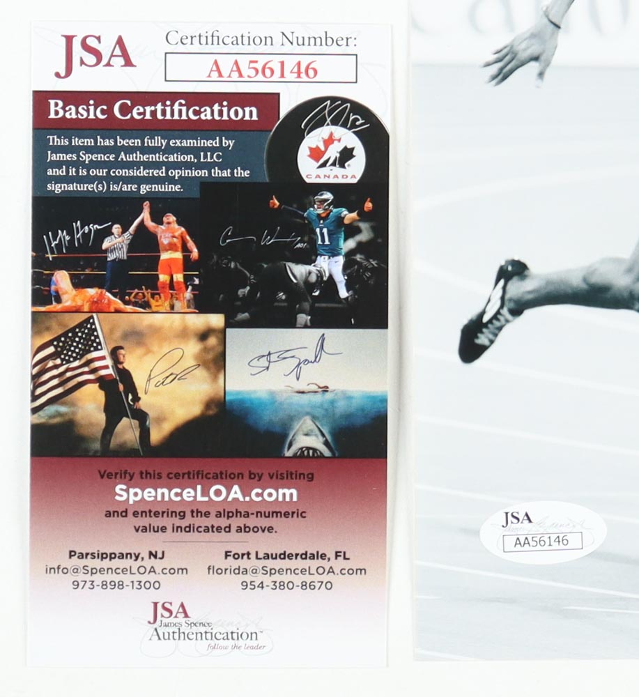 Usain Bolt Signed Team Jamaica 8x10 Photo (Beckett) at PristineAuction.com Usain Bolt Signed Team Jamaica 8x10 Photo (Beckett) at PristineAuction.com