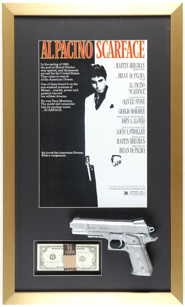 "Scarface" Custom Framed Movie Poster Display with Movie Prop Replica Money & Pistol at PristineAuction.com "Scarface" Custom Framed Movie Poster Display with Movie Prop Replica Money & Pistol at PristineAuction.com