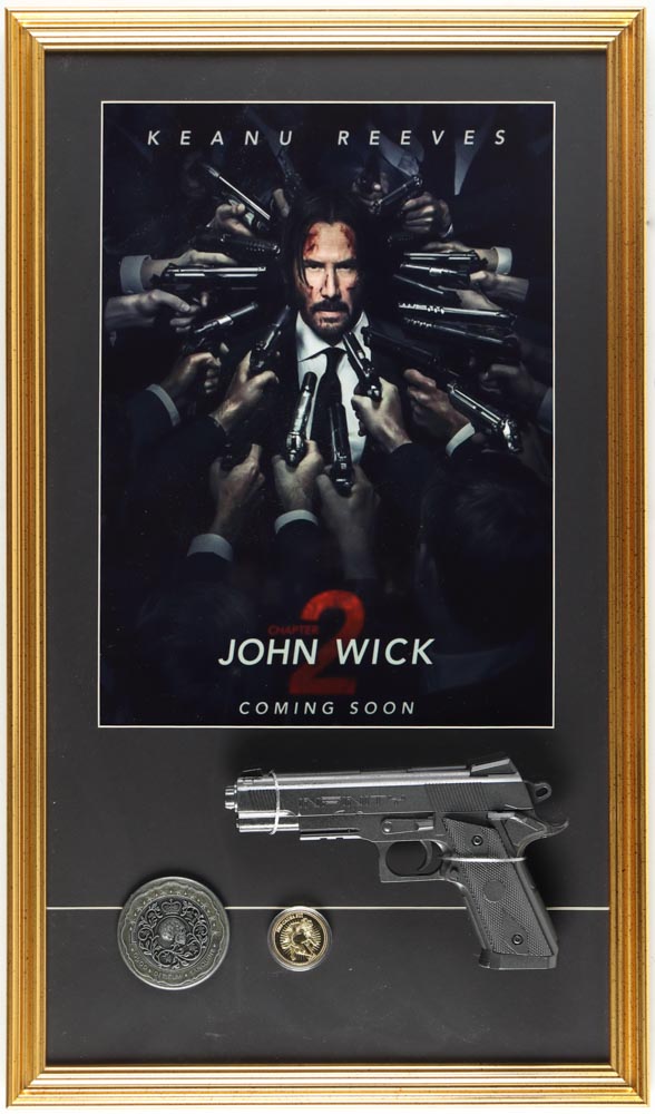 "John Wick Chapter 2" Custom Framed Movie Poster Display with Replica Prop Pistol, Sophia Blood Oath Marker & Gold Coin at PristineAuction.com "John Wick Chapter 2" Custom Framed Movie Poster Display with Replica Prop Pistol, Sophia Blood Oath Marker & Gold Coin at PristineAuction.com