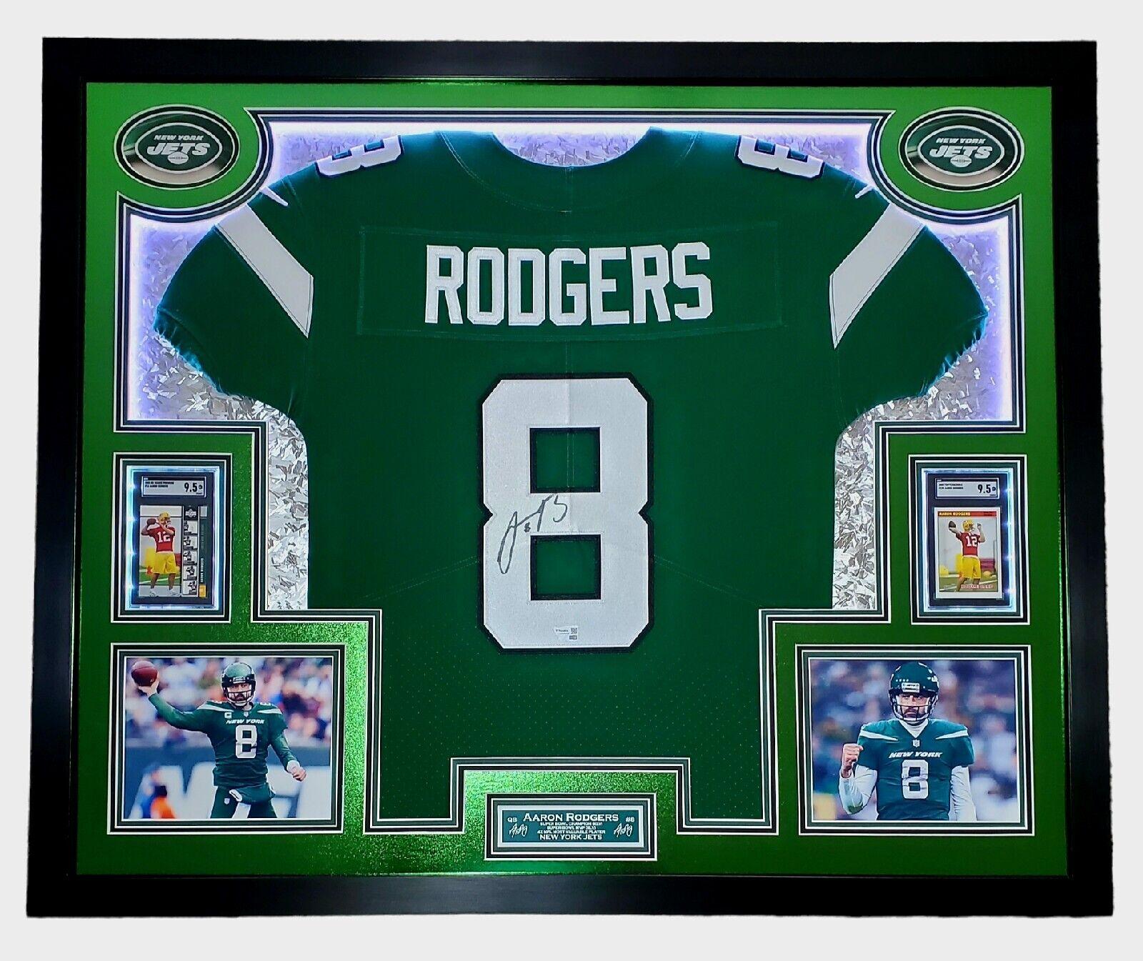 Aaron Rodgers Signed 33x42 Custom Framed Jersey Display with LED Lighting, 2005 UD Rookie Premiere #16 (RC) (SGC9.5)& 2005 Topps Bazooka #190 (RC) (SGC9.5) (Fanatics) at PristineAuction.com Aaron Rodgers Signed 33x42 Custom Framed Jersey Display with LED Lighting, 2005 UD Rookie Premiere #16 (RC) (SGC9.5)& 2005 Topps Bazooka #190 (RC) (SGC9.5) (Fanatics) at PristineAuction.com