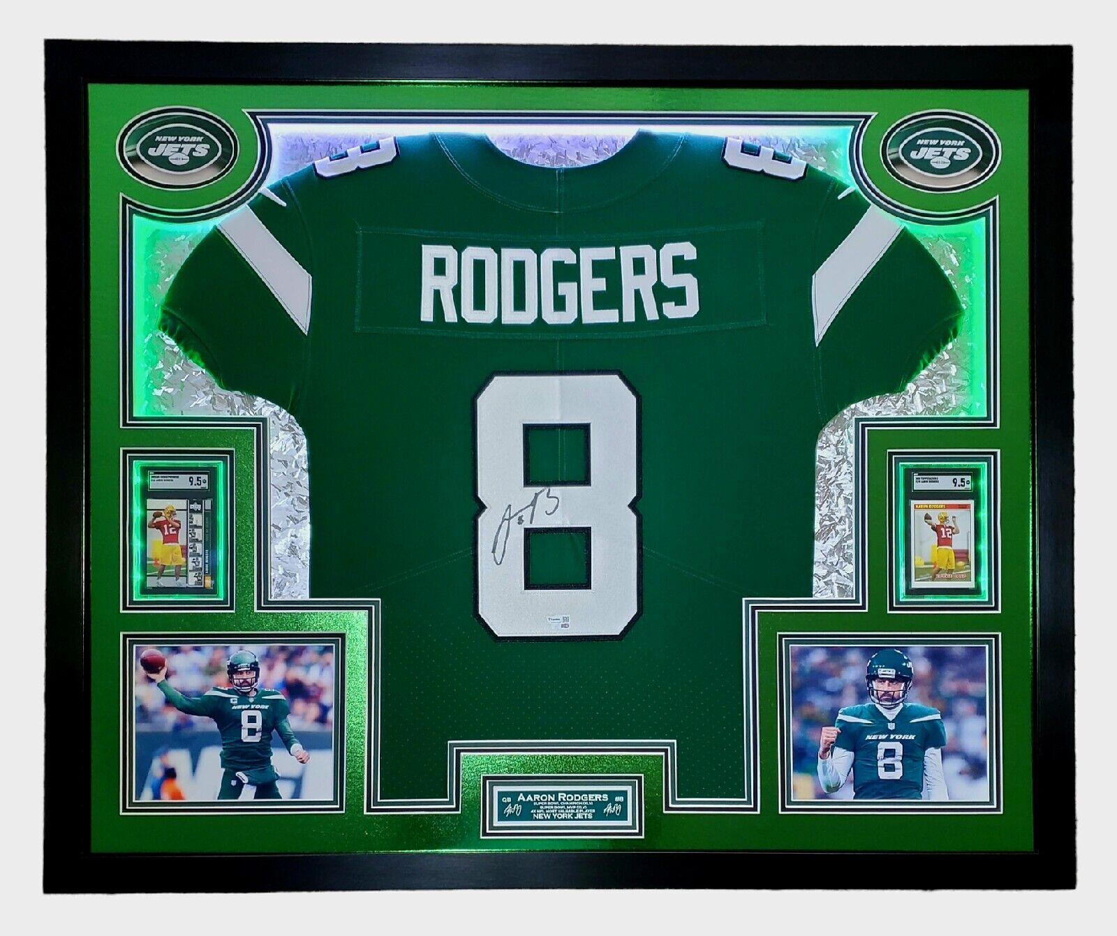 Aaron Rodgers Signed 33x42 Custom Framed Jersey Display with LED Lighting, 2005 UD Rookie Premiere #16 (RC) (SGC9.5)& 2005 Topps Bazooka #190 (RC) (SGC9.5) (Fanatics) at PristineAuction.com Aaron Rodgers Signed 33x42 Custom Framed Jersey Display with LED Lighting, 2005 UD Rookie Premiere #16 (RC) (SGC9.5)& 2005 Topps Bazooka #190 (RC) (SGC9.5) (Fanatics) at PristineAuction.com