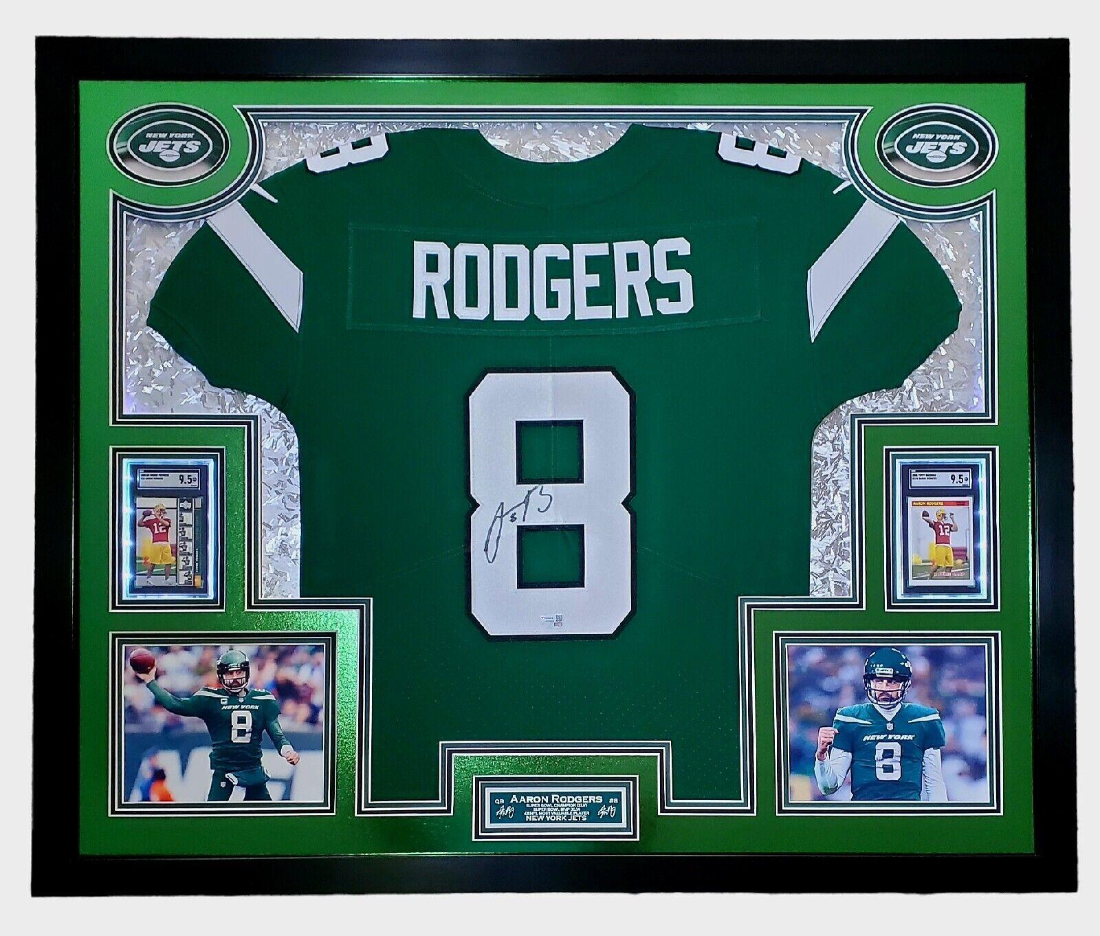 Aaron Rodgers Signed 33x42 Custom Framed Jersey Display with LED Lighting, 2005 UD Rookie Premiere #16 (RC) (SGC9.5)& 2005 Topps Bazooka #190 (RC) (SGC9.5) (Fanatics) at PristineAuction.com Aaron Rodgers Signed 33x42 Custom Framed Jersey Display with LED Lighting, 2005 UD Rookie Premiere #16 (RC) (SGC9.5)& 2005 Topps Bazooka #190 (RC) (SGC9.5) (Fanatics) at PristineAuction.com