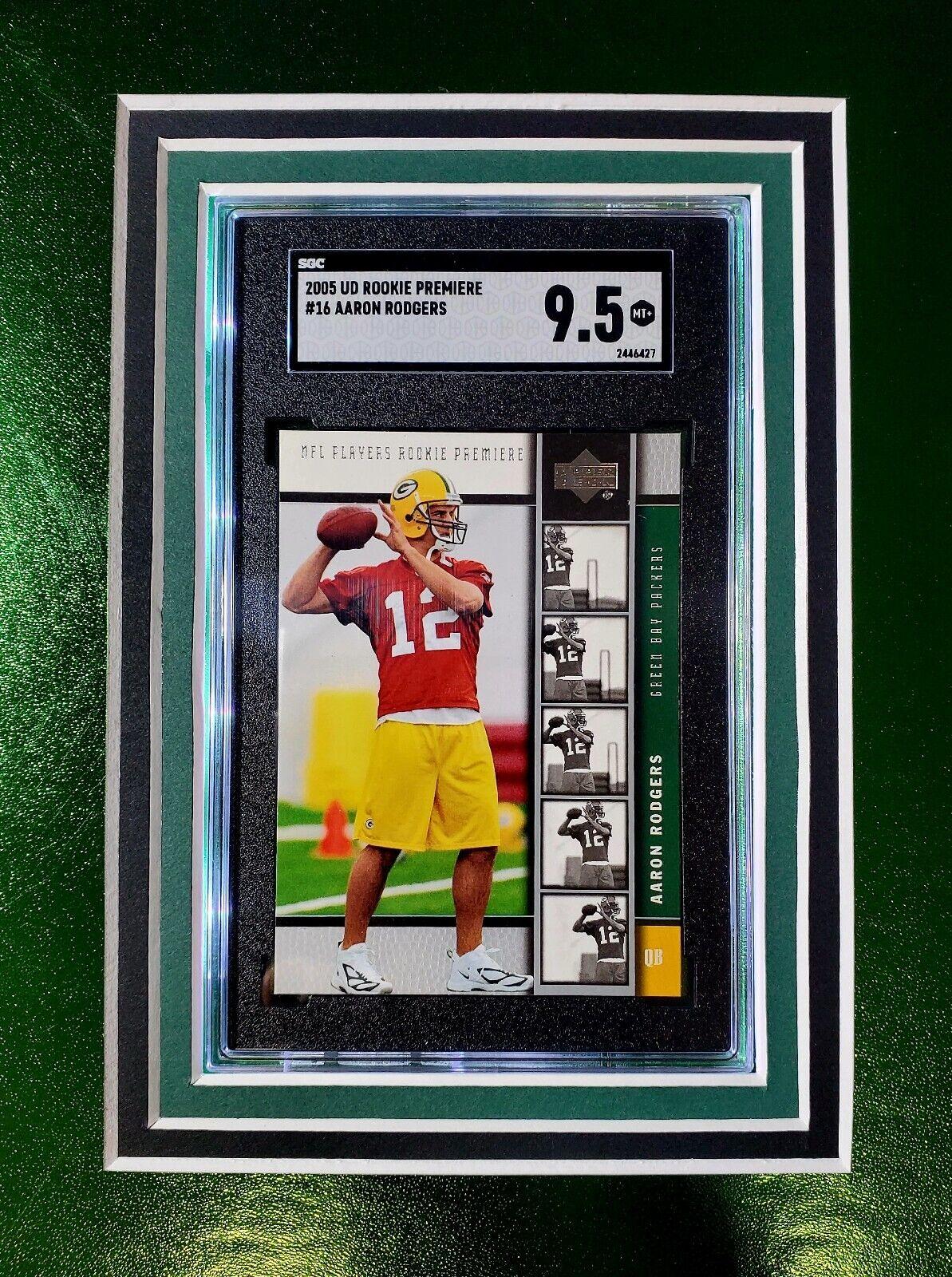 Aaron Rodgers Signed 33x42 Custom Framed Jersey Display with LED Lighting, 2005 UD Rookie Premiere #16 (RC) (SGC9.5)& 2005 Topps Bazooka #190 (RC) (SGC9.5) (Fanatics) at PristineAuction.com Aaron Rodgers Signed 33x42 Custom Framed Jersey Display with LED Lighting, 2005 UD Rookie Premiere #16 (RC) (SGC9.5)& 2005 Topps Bazooka #190 (RC) (SGC9.5) (Fanatics) at PristineAuction.com