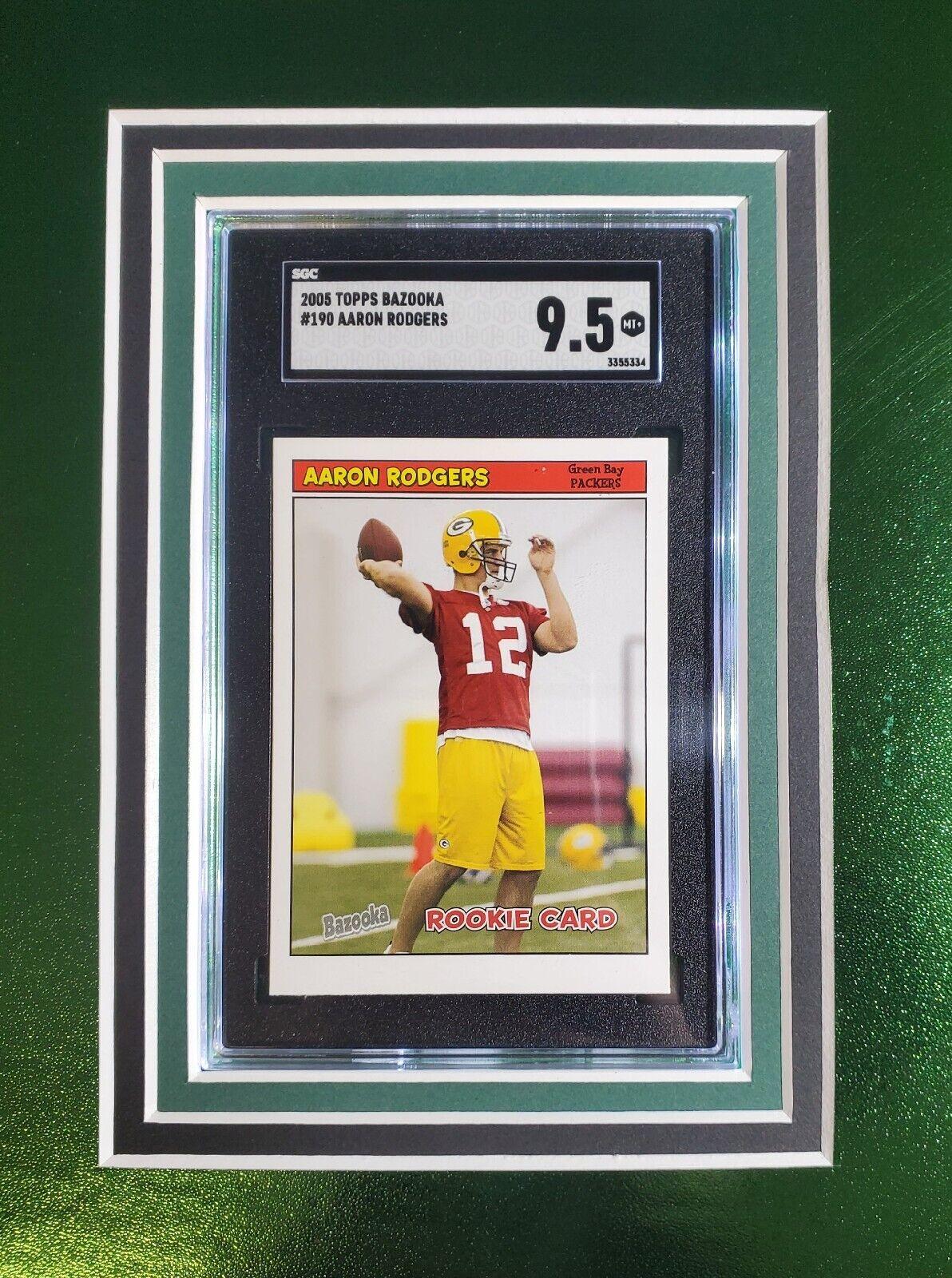 Aaron Rodgers Signed 33x42 Custom Framed Jersey Display with LED Lighting, 2005 UD Rookie Premiere #16 (RC) (SGC9.5)& 2005 Topps Bazooka #190 (RC) (SGC9.5) (Fanatics) at PristineAuction.com Aaron Rodgers Signed 33x42 Custom Framed Jersey Display with LED Lighting, 2005 UD Rookie Premiere #16 (RC) (SGC9.5)& 2005 Topps Bazooka #190 (RC) (SGC9.5) (Fanatics) at PristineAuction.com