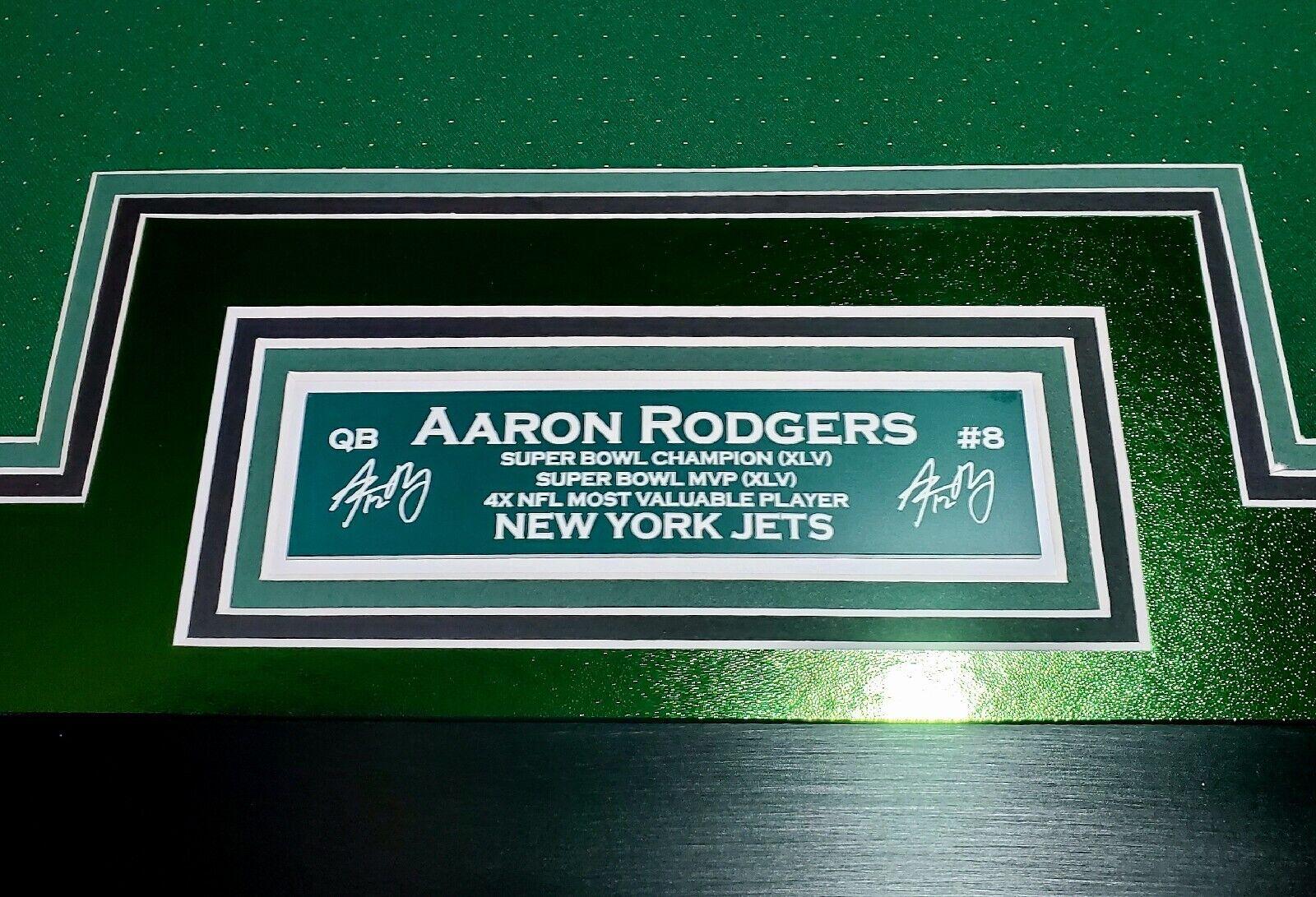Aaron Rodgers Signed 33x42 Custom Framed Jersey Display with LED Lighting, 2005 UD Rookie Premiere #16 (RC) (SGC9.5)& 2005 Topps Bazooka #190 (RC) (SGC9.5) (Fanatics) at PristineAuction.com Aaron Rodgers Signed 33x42 Custom Framed Jersey Display with LED Lighting, 2005 UD Rookie Premiere #16 (RC) (SGC9.5)& 2005 Topps Bazooka #190 (RC) (SGC9.5) (Fanatics) at PristineAuction.com
