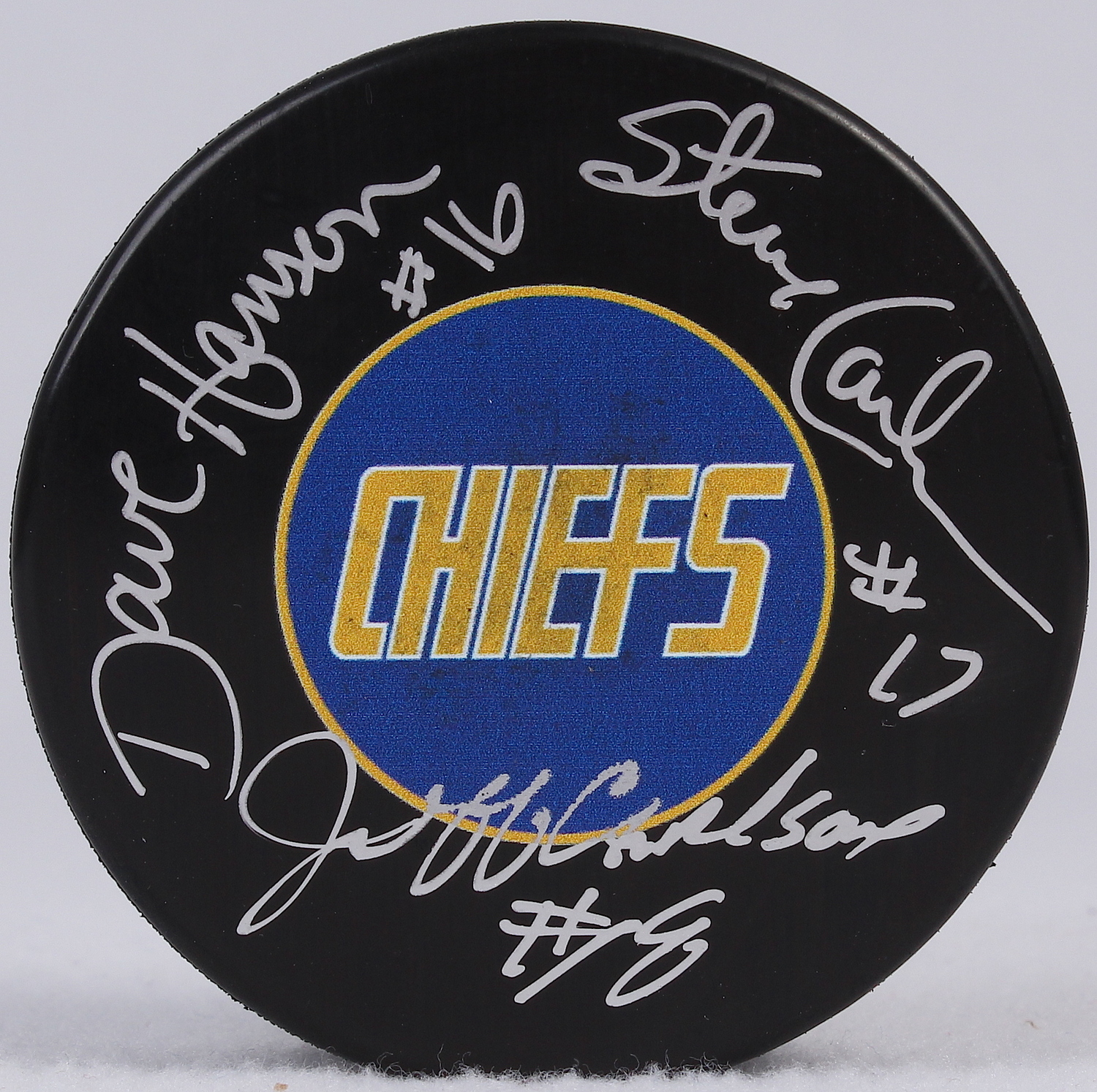 Dave Hanson, Steve Carlson & Jeff Carlson Signed Chiefs Logo Hockey Puck (SI COA) at PristineAuction.com Dave Hanson, Steve Carlson & Jeff Carlson Signed Chiefs Logo Hockey Puck (SI COA) at PristineAuction.com