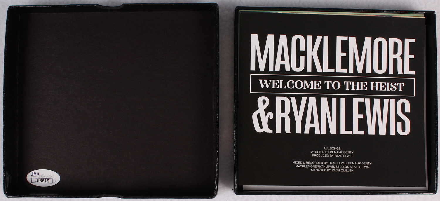 Macklemore & Ryan Lewis Signed "The Heist" CD Box (JSA COA) at PristineAuction.com Macklemore & Ryan Lewis Signed "The Heist" CD Box (JSA COA) at PristineAuction.com