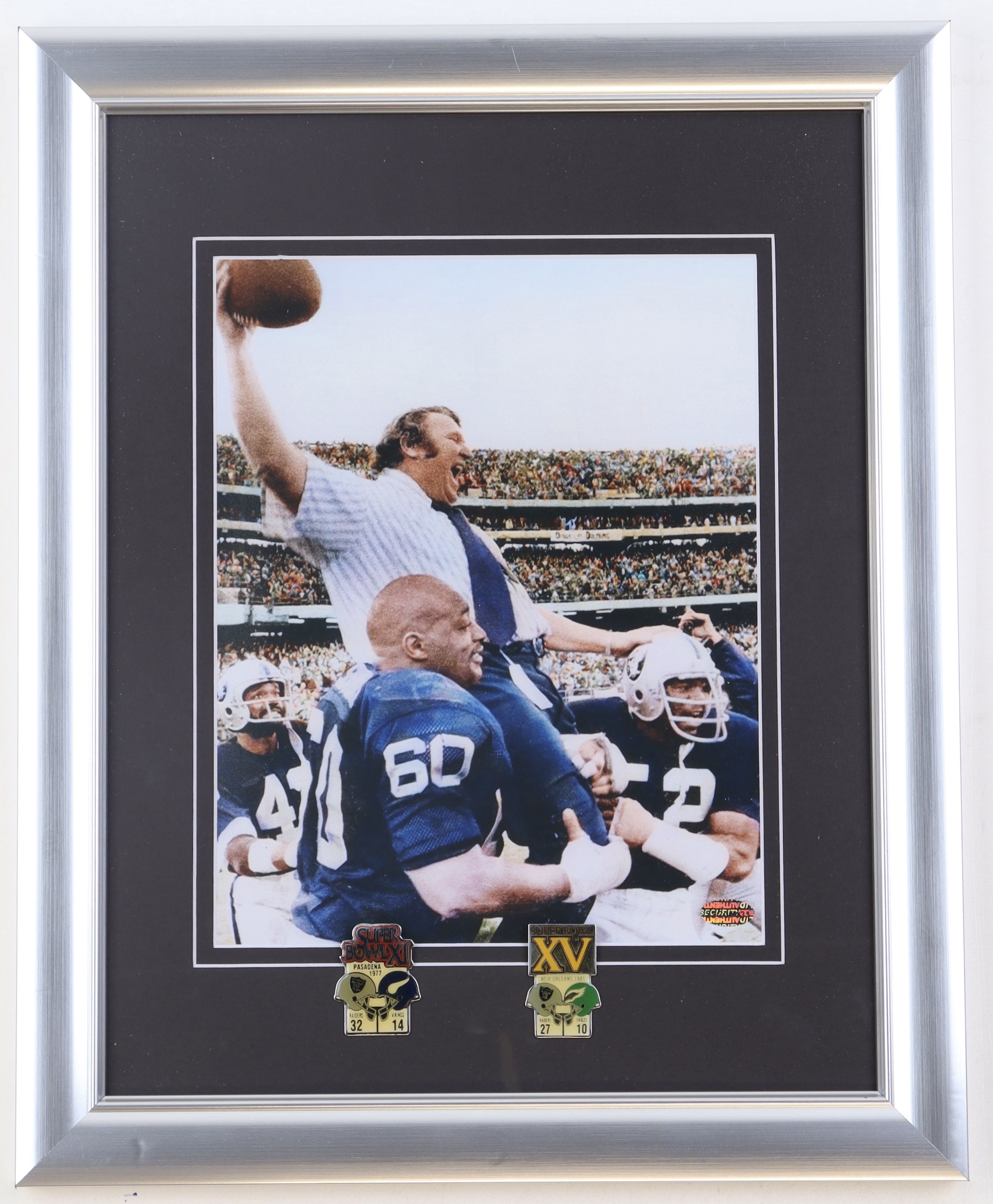 John Madden Oakland Raiders Custom Framed Photo with Set of (2) Official Super Bowl XI & XV Pins at PristineAuction.com John Madden Oakland Raiders Custom Framed Photo with Set of (2) Official Super Bowl XI & XV Pins at PristineAuction.com