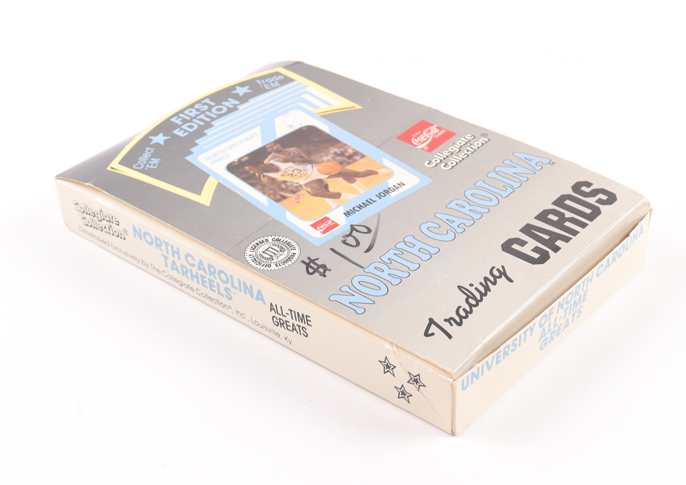 1989-90 First Edition Collegiate Collection Coca-Cola North Carolina Tar Heels Trading Card Box of (32) Packs at PristineAuction.com 1989-90 First Edition Collegiate Collection Coca-Cola North Carolina Tar Heels Trading Card Box of (32) Packs at PristineAuction.com