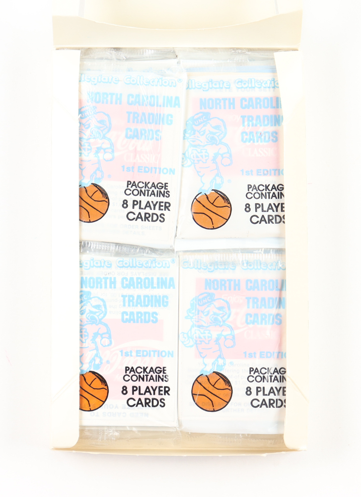 1989-90 First Edition Collegiate Collection Coca-Cola North Carolina Tar Heels Trading Card Box of (32) Packs at PristineAuction.com 1989-90 First Edition Collegiate Collection Coca-Cola North Carolina Tar Heels Trading Card Box of (32) Packs at PristineAuction.com