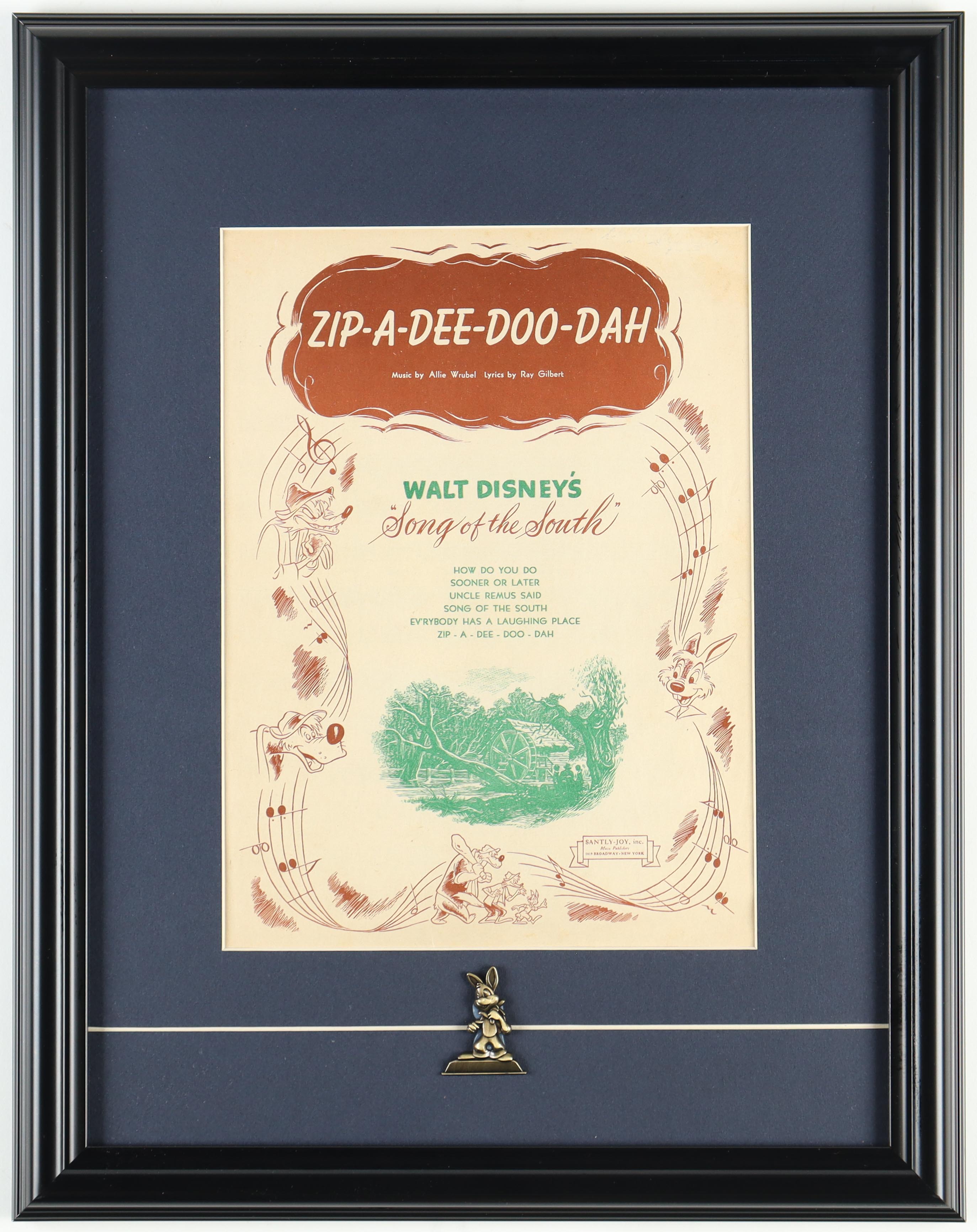 Walt Disney's "Song Of The South" Custom Framed Sheet Music Display With Retired B'rer Rabbit Statue Pin at PristineAuction.com Walt Disney's "Song Of The South" Custom Framed Sheet Music Display With Retired B'rer Rabbit Statue Pin at PristineAuction.com