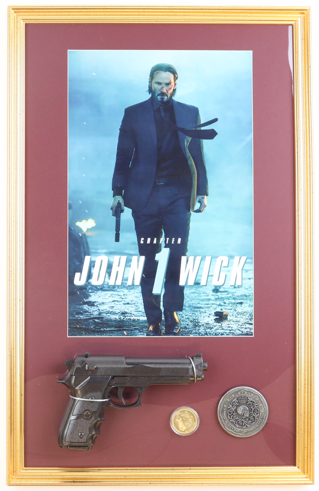 "John Wick: Chapter 1" Custom Framed Movie Poster Display with Prop Replica Pistol, Oath Marker & Gold Coin at PristineAuction.com "John Wick: Chapter 1" Custom Framed Movie Poster Display with Prop Replica Pistol, Oath Marker & Gold Coin at PristineAuction.com