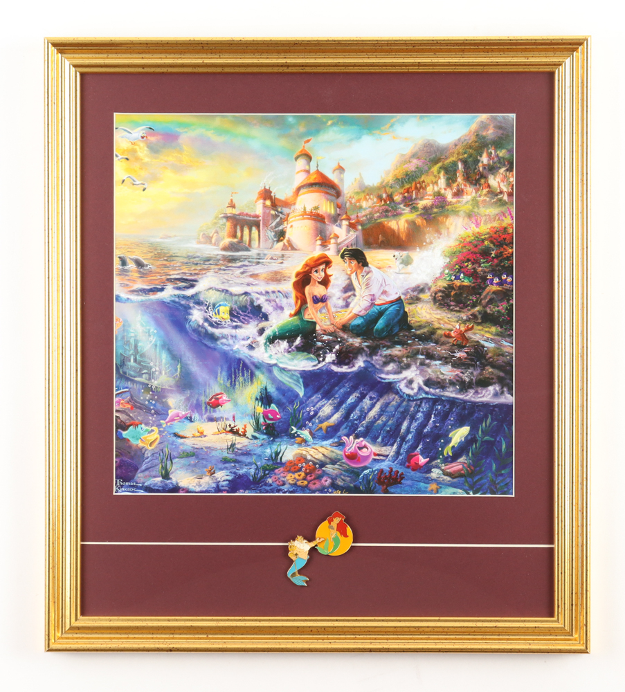 Thomas Kinkade "The Little Mermaid" Custom Framed Print Display with Set of (2) Official Movie Pins at PristineAuction.com Thomas Kinkade "The Little Mermaid" Custom Framed Print Display with Set of (2) Official Movie Pins at PristineAuction.com