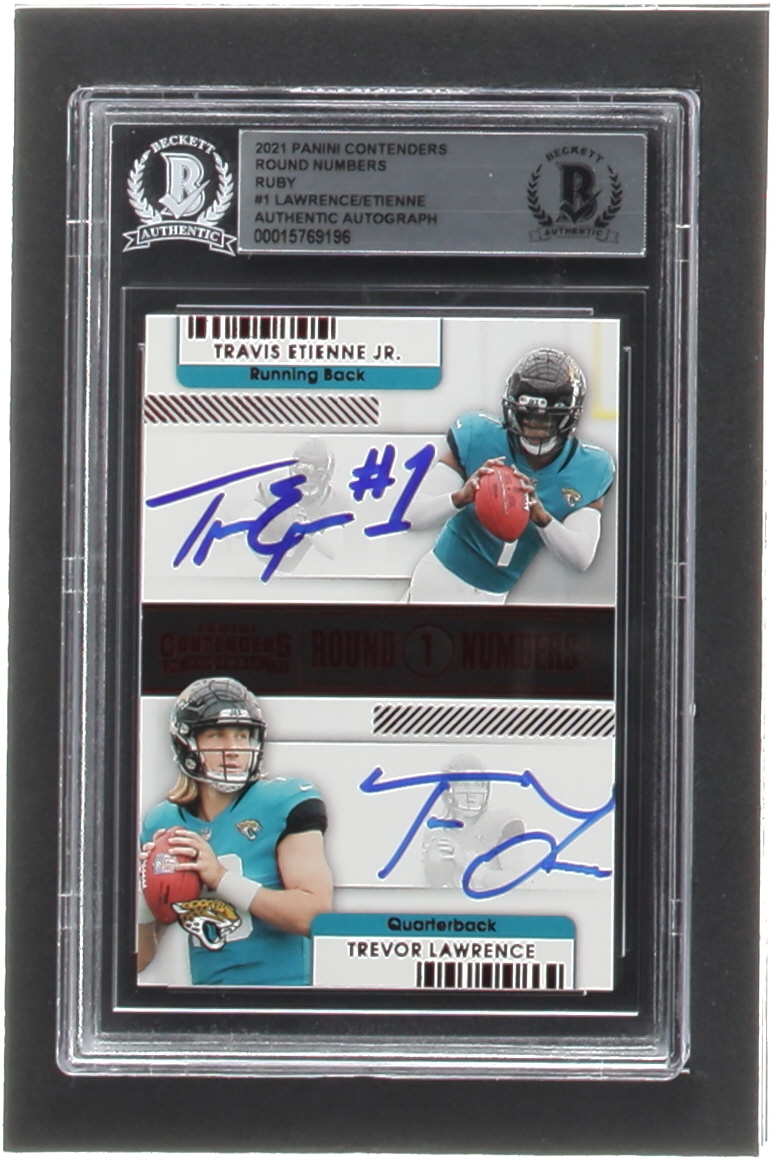 Travis Etienne Jr. & Trevor Lawrence Signed 2021 Panini Contenders Round Numbers Ruby #1 RC (BGS) at PristineAuction.com Travis Etienne Jr. & Trevor Lawrence Signed 2021 Panini Contenders Round Numbers Ruby #1 RC (BGS) at PristineAuction.com