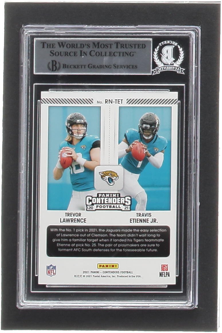 Travis Etienne Jr. & Trevor Lawrence Signed 2021 Panini Contenders Round Numbers Ruby #1 RC (BGS) at PristineAuction.com Travis Etienne Jr. & Trevor Lawrence Signed 2021 Panini Contenders Round Numbers Ruby #1 RC (BGS) at PristineAuction.com