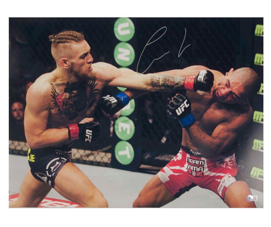 Conor McGregor Signed UFC 16x24 Photo (Beckett) at PristineAuction.com Conor McGregor Signed UFC 16x24 Photo (Beckett) at PristineAuction.com