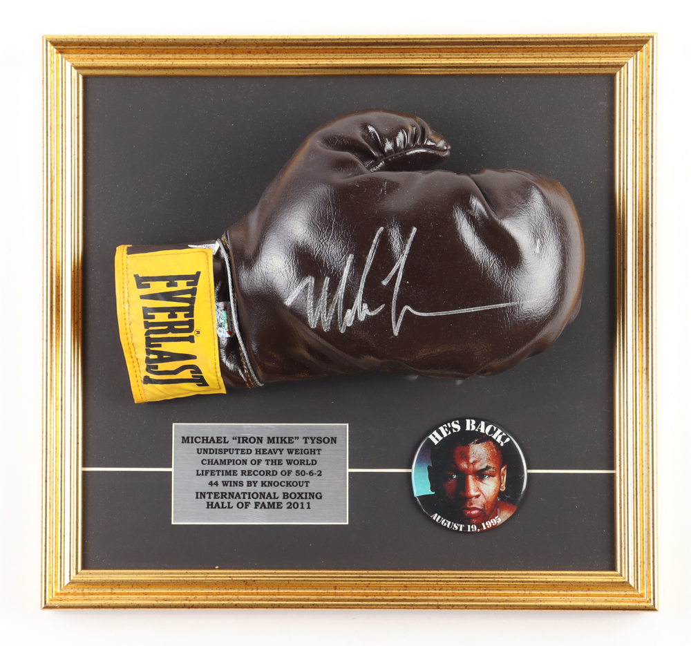 Mike Tyson Signed Custom Framed Vintage Everlast Boxing Glove with 1995 "He's Back" Pin (JSA & Tyson) at PristineAuction.com Mike Tyson Signed Custom Framed Vintage Everlast Boxing Glove with 1995 "He's Back" Pin (JSA & Tyson) at PristineAuction.com